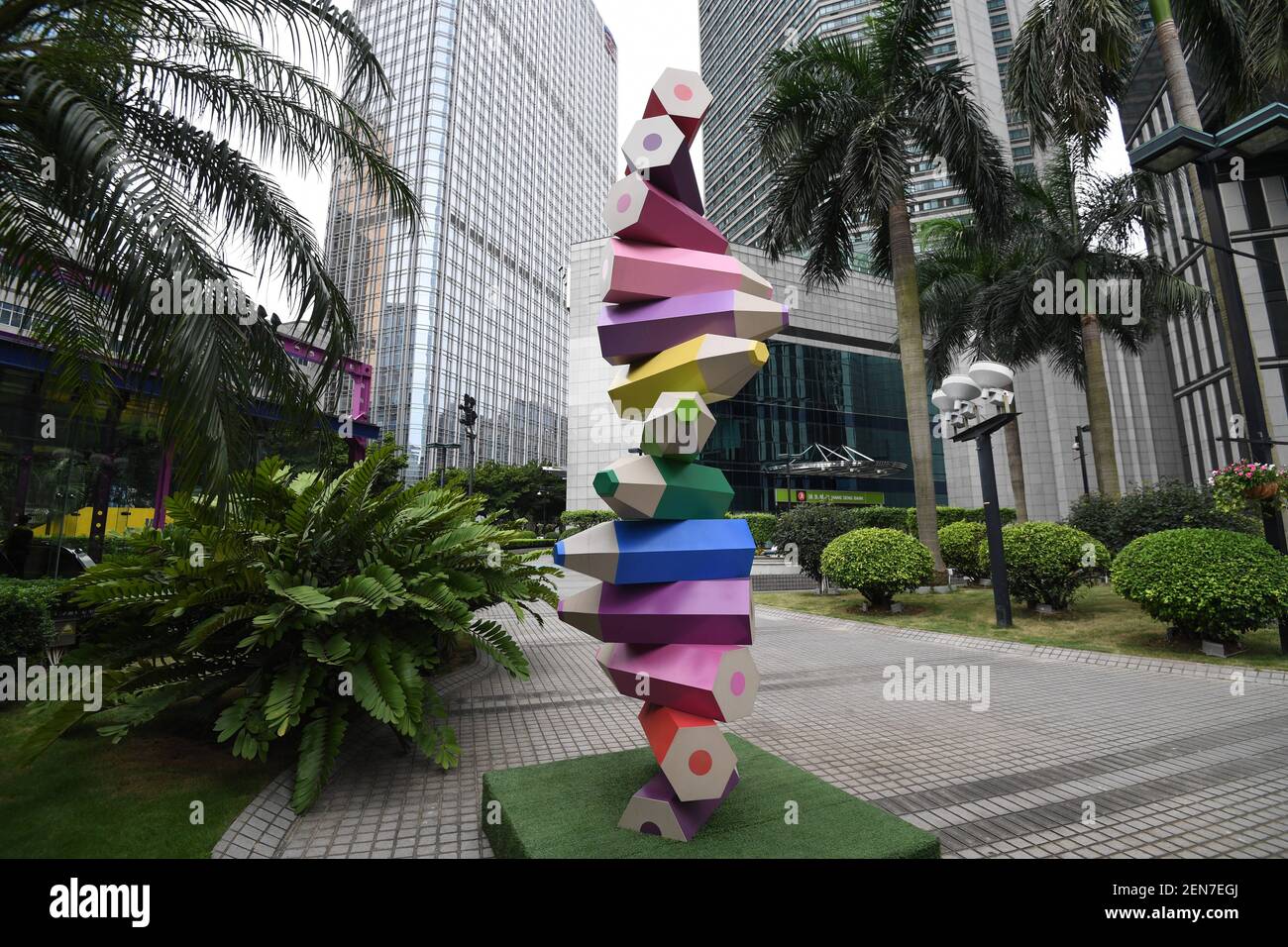 A colored pencil installation is on display at a square amongst office  buildings in Guangzhou city, south China's Guangdong province, 23 June  2019. A square amongst a cluster of high-rise office buildings