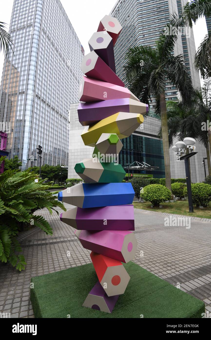 A colored pencil installation is on display at a square amongst office  buildings in Guangzhou city, south China's Guangdong province, 23 June  2019. A square amongst a cluster of high-rise office buildings