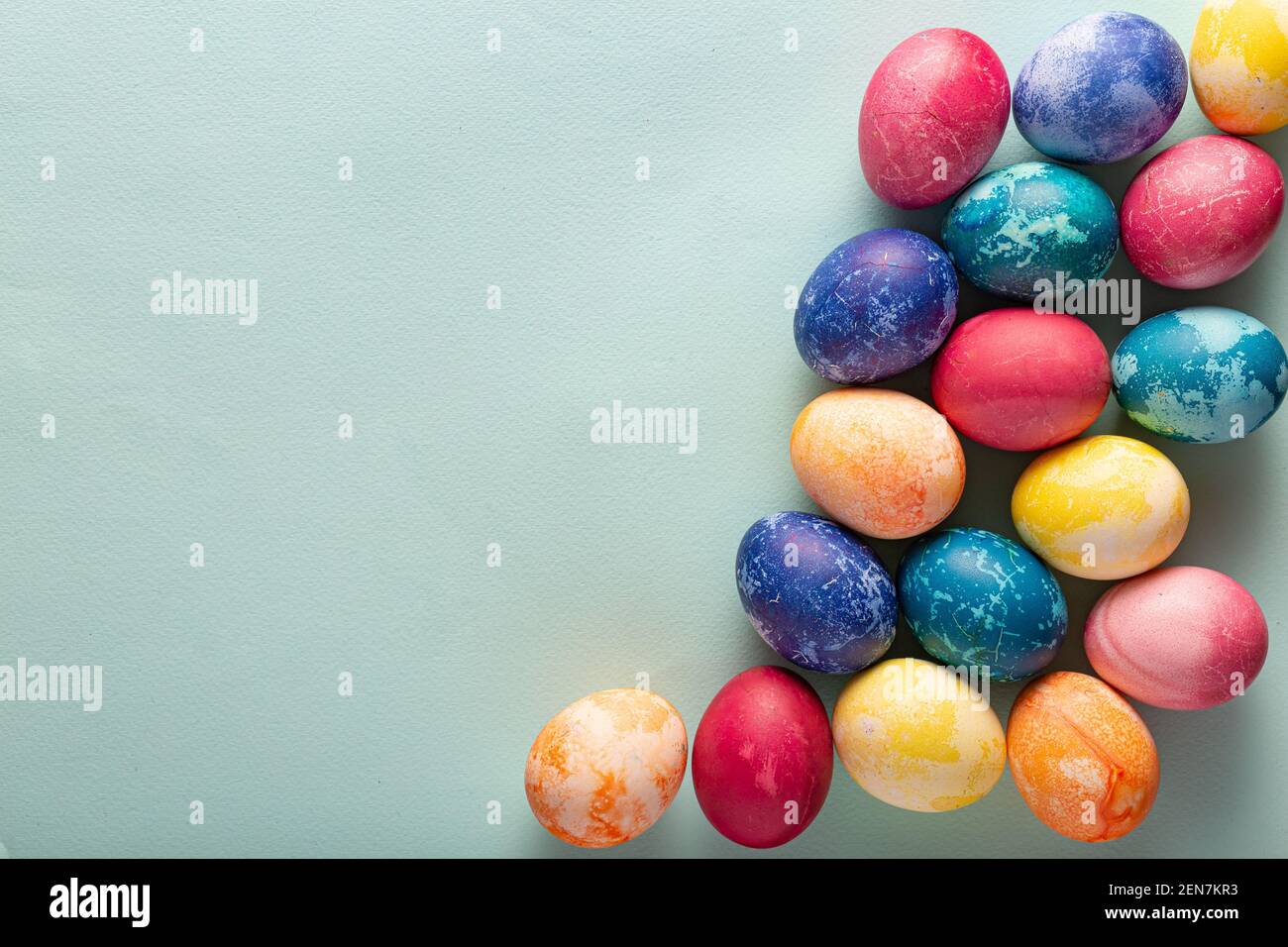 Painted Easter eggs on a blue background Stock Photo