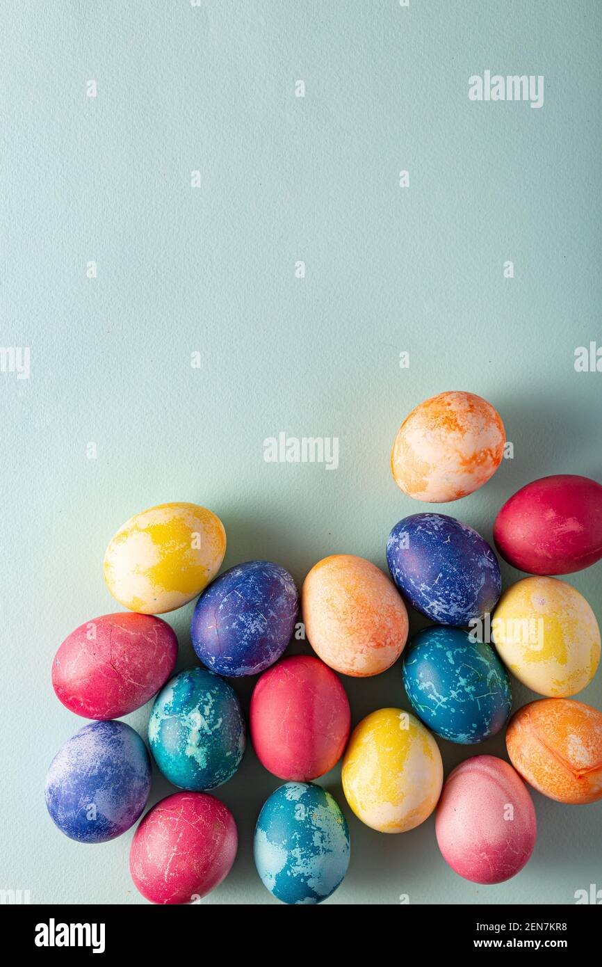 Painted Easter eggs on a blue background Stock Photo