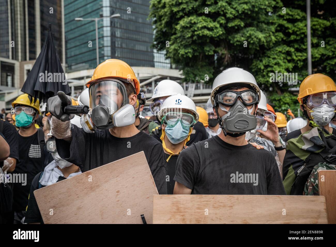 Anti government protesters seen equipped with gas masks to protect ...