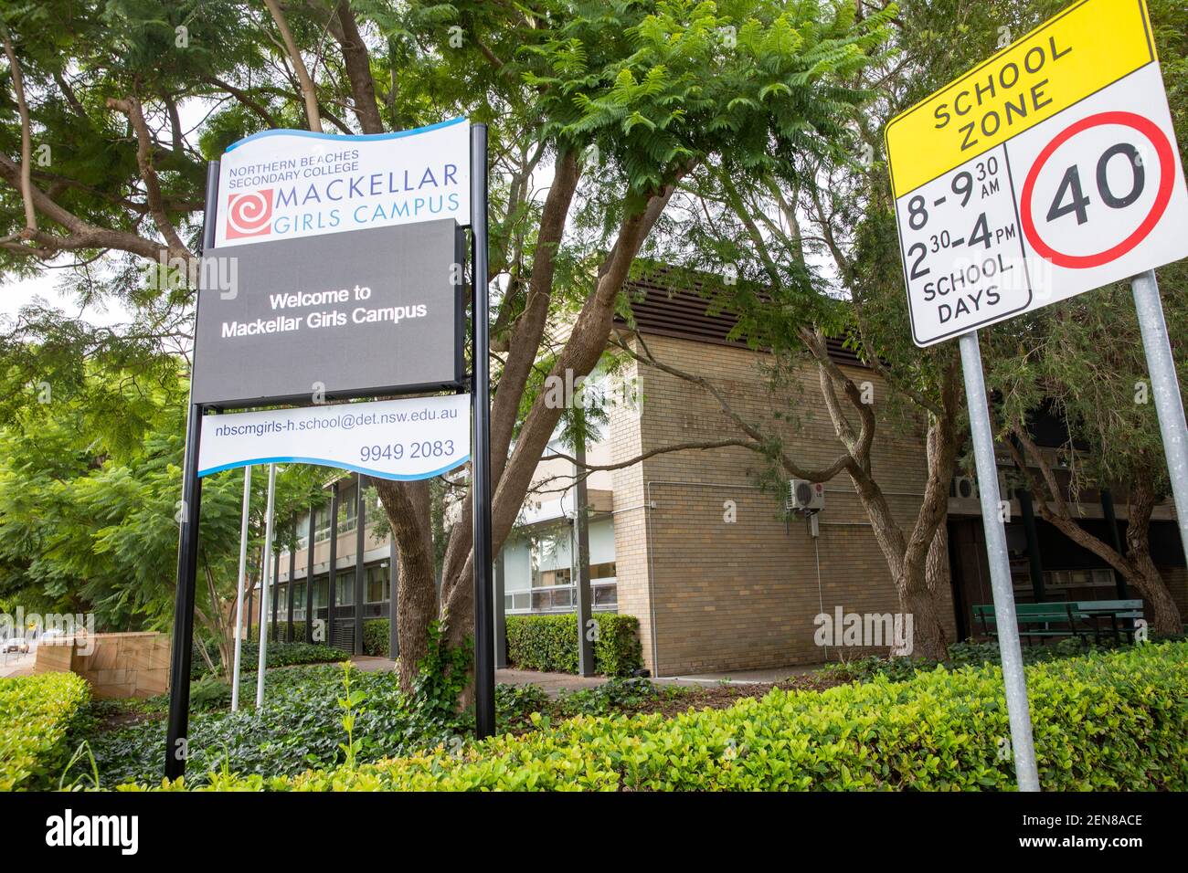 Mackellar girls secondary school in Sydney with school zone sign and