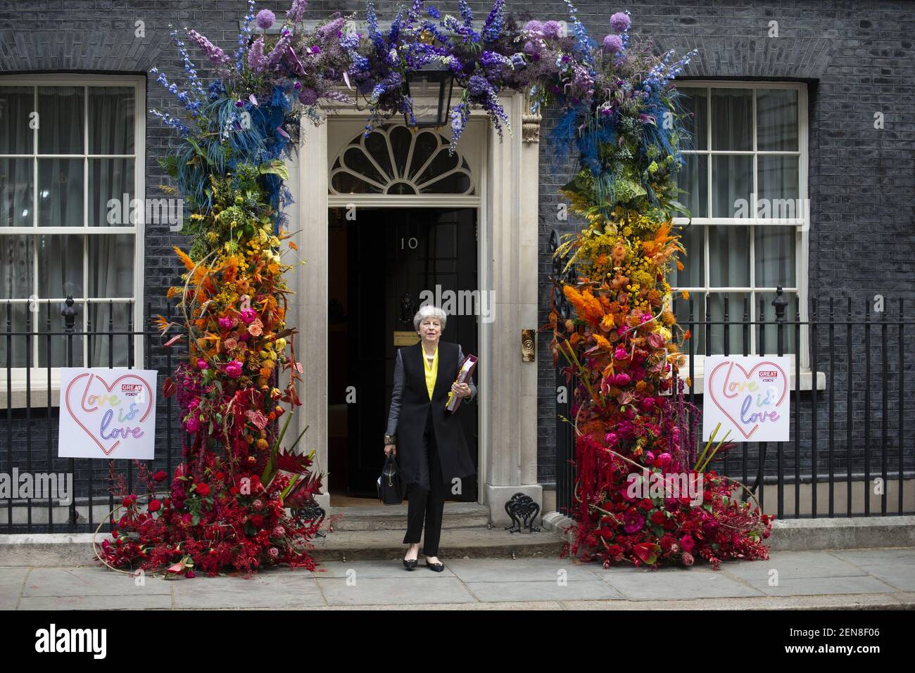 Prime Minister Theresa May departs 10 Downing Street to attend Prime Ministers questions in the House of Commons in Central London, UK on June 3, 2019. The front door of No 10 Downing Street is decorated in rainbow coloured fresh flowers to celebrate the LGBTI community in Pride month. (Photo by Claire Doherty/Sipa USA) Stock Photo