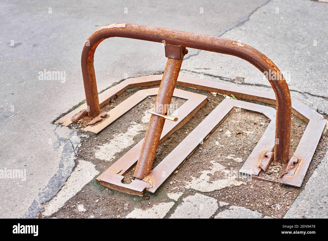 Manual car parking barrier with padlock in city Stock Photo Alamy