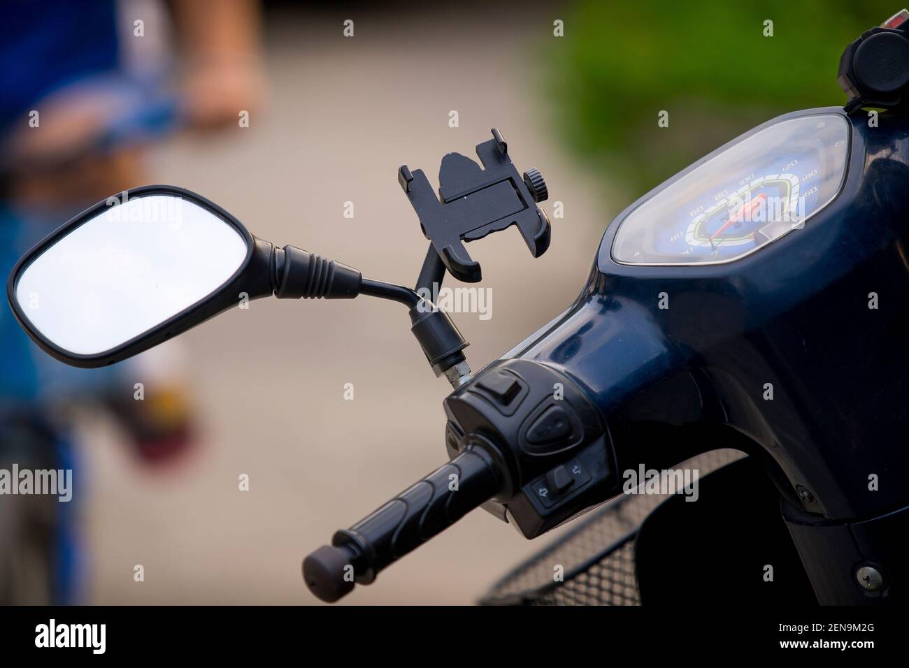 Motorcycle steering wheel with fairing and a case holder for a mobile phone. Stock Photo