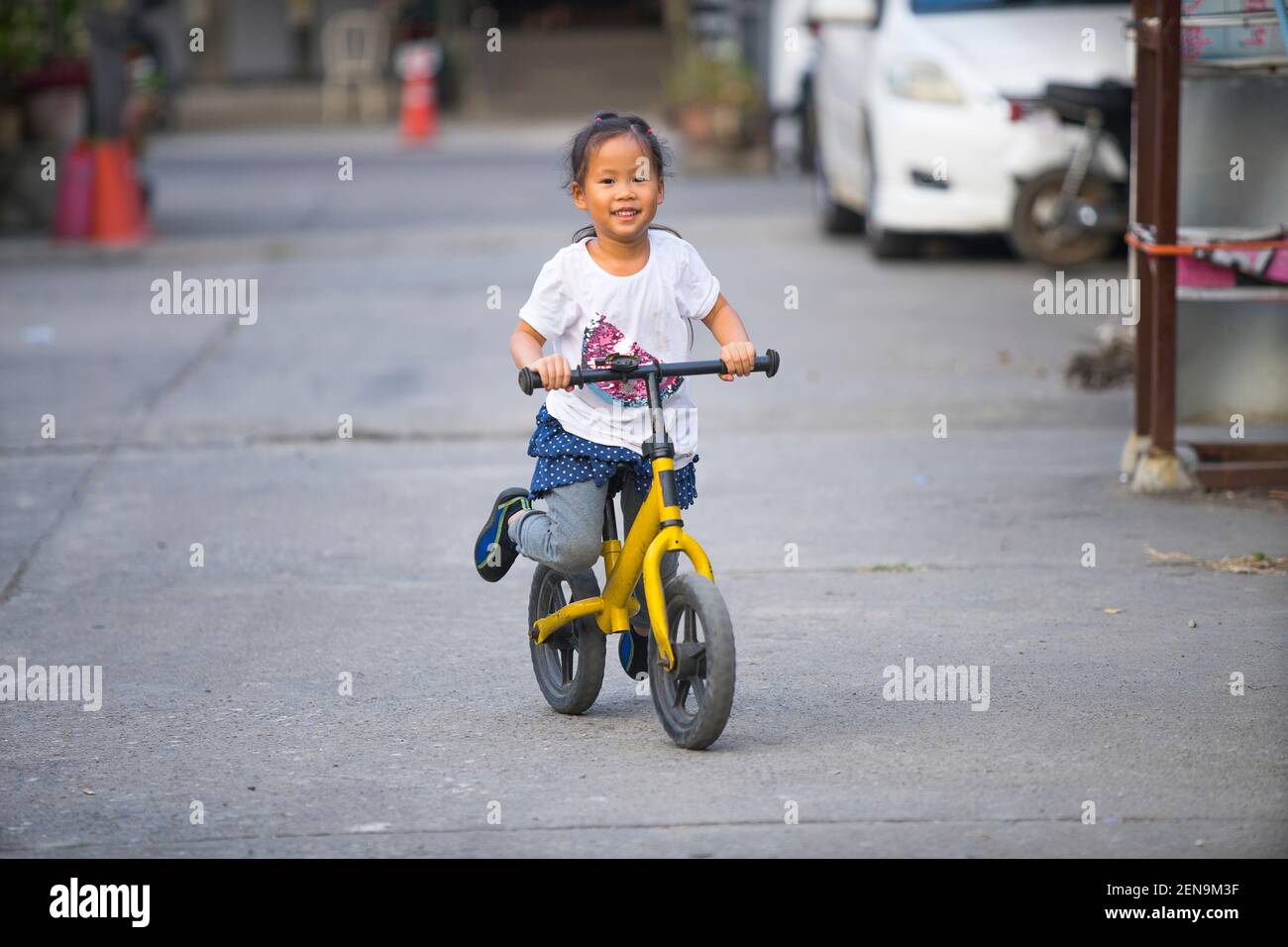 Cycle riding doll girl hi res stock photography and images Alamy