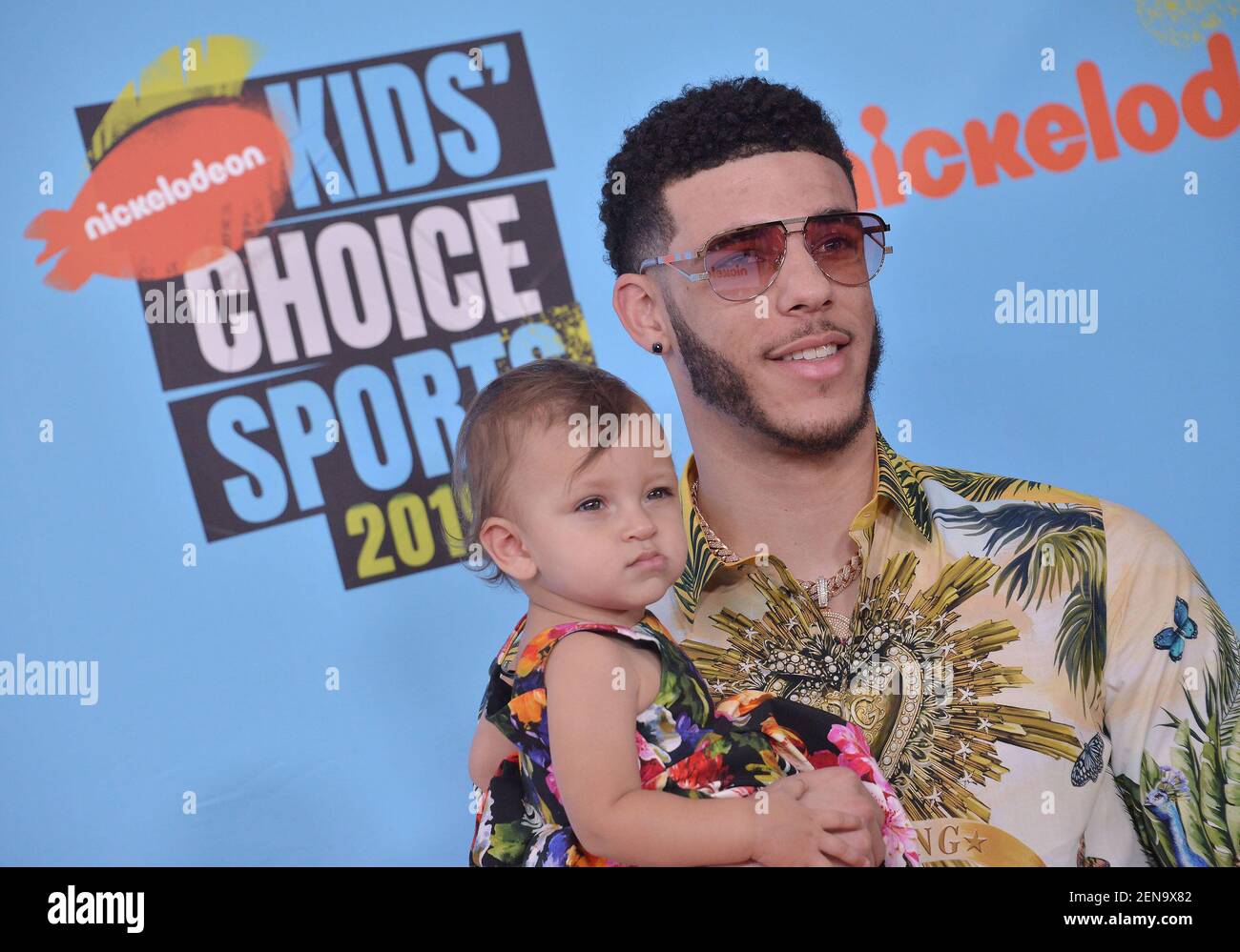 (R-L) Lonzo Ball and Daughter Zoey Christina Ball arrives at the