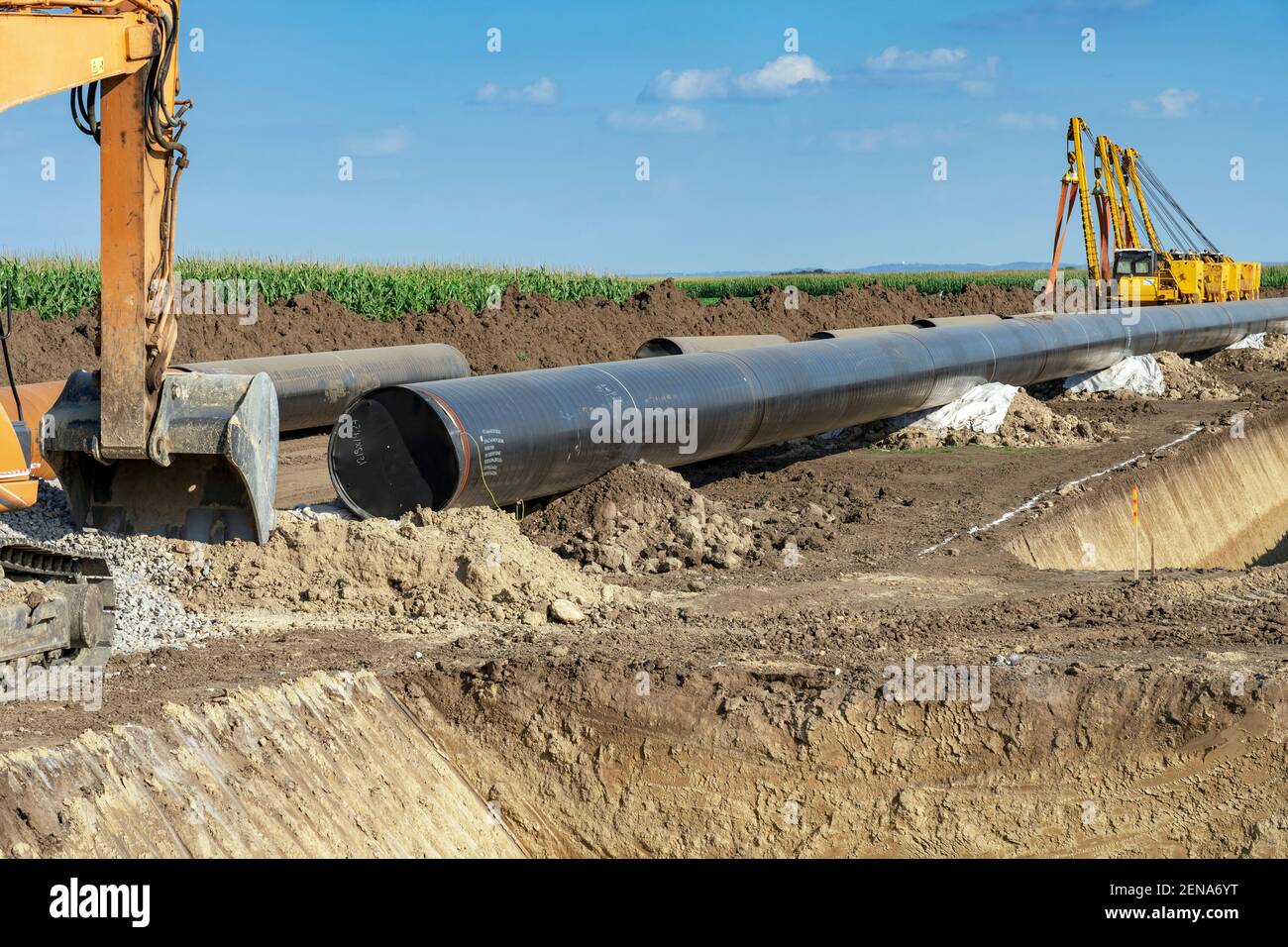 Construction Machinery at Natural Gas Pipeline Construction Site in Cultivated Agricultural Farm Field. Oil and Gas Industry. Turkish Stream. Stock Photo