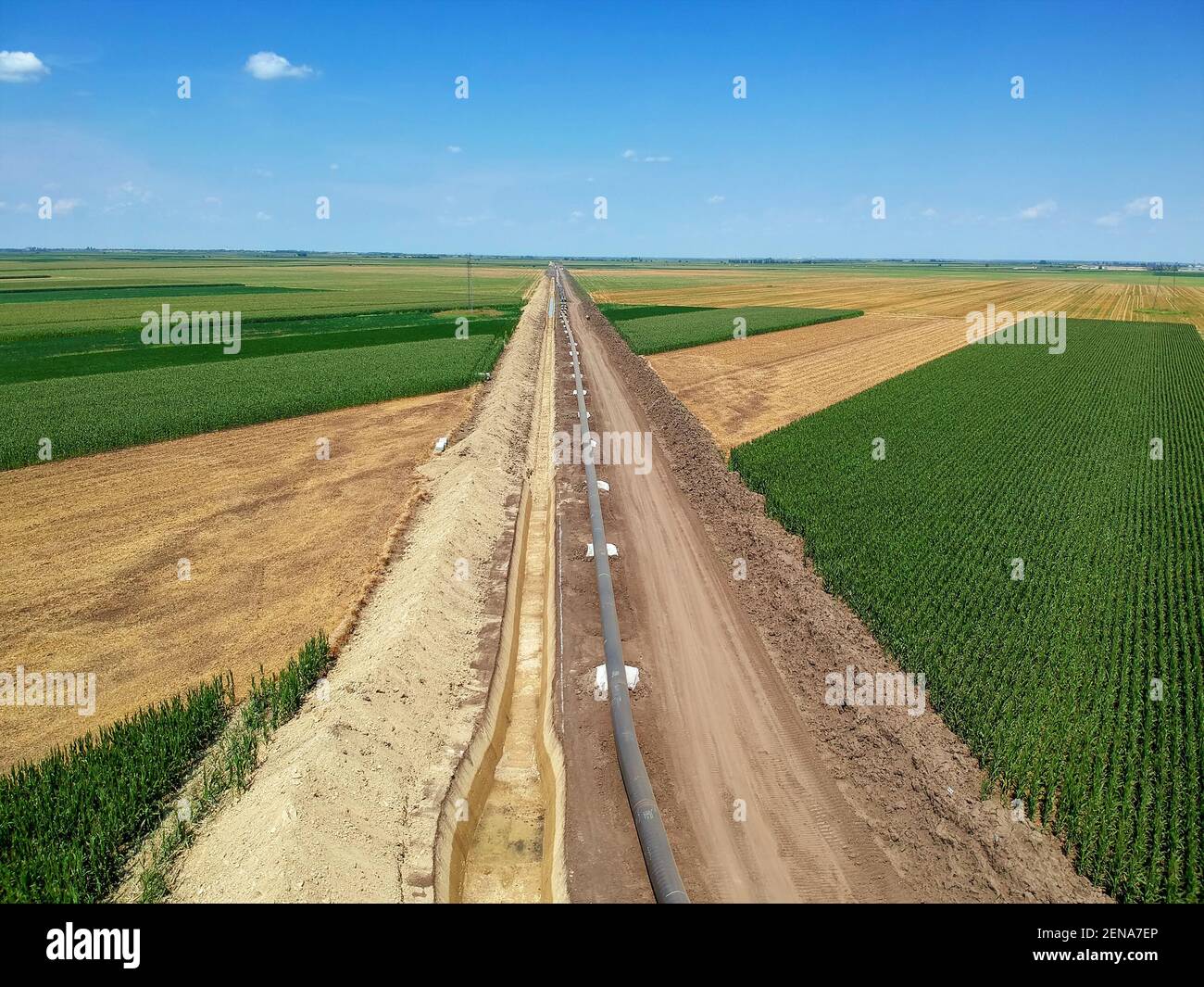 Aerial Photo of Natural Gas Pipeline Construction in Cultivated Agricultural Farm Field. Oil and Gas Industry. Turkish Stream. Stock Photo