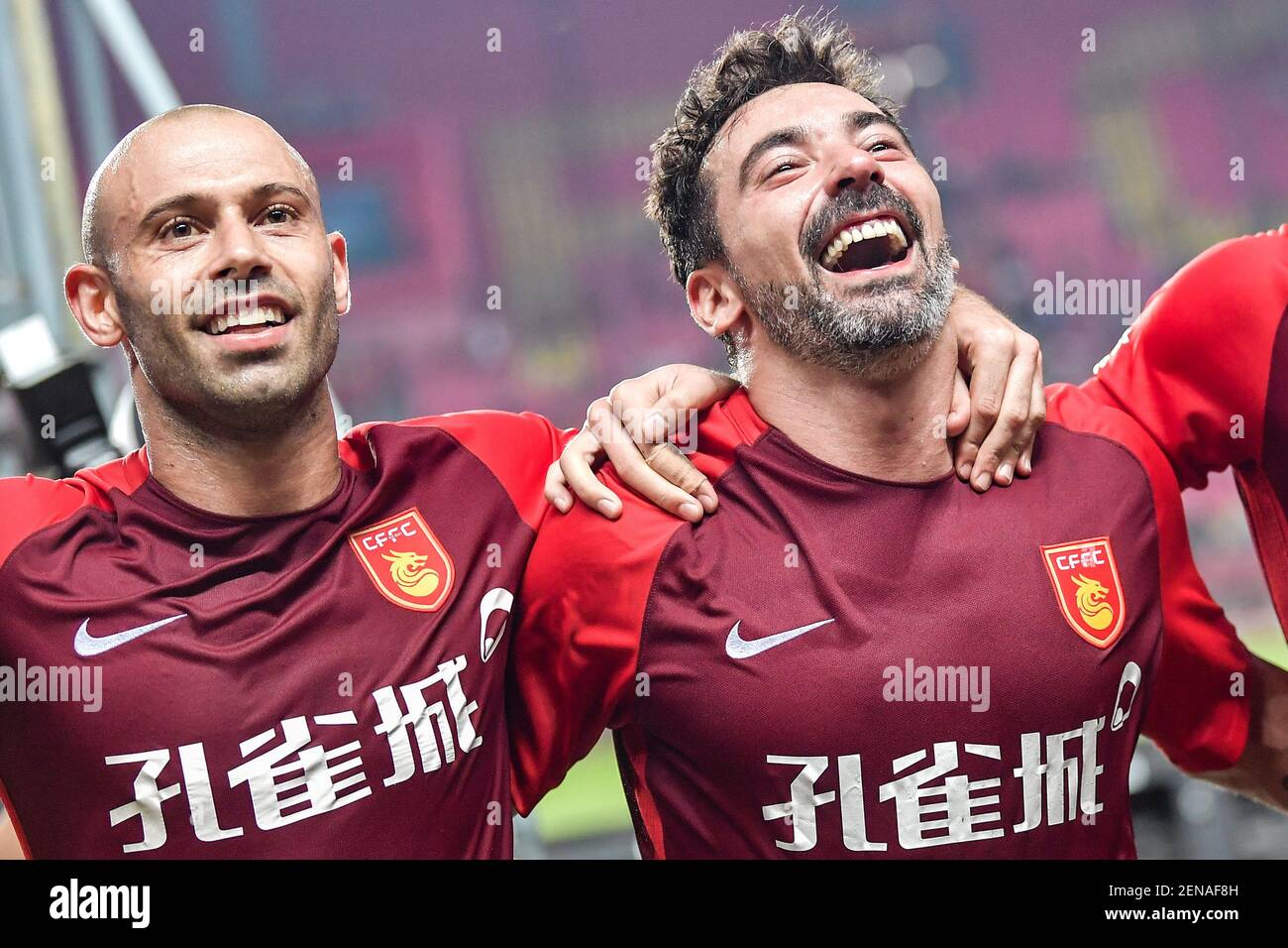 Argentine football players Javier Mascherano, left, and Ezequiel Lavezzi of  Hebei China Fortune celebrate after their 17th round match against Shanghai  Greenland Shenhua during the 2019 Chinese Football Association Super League  (CSL)