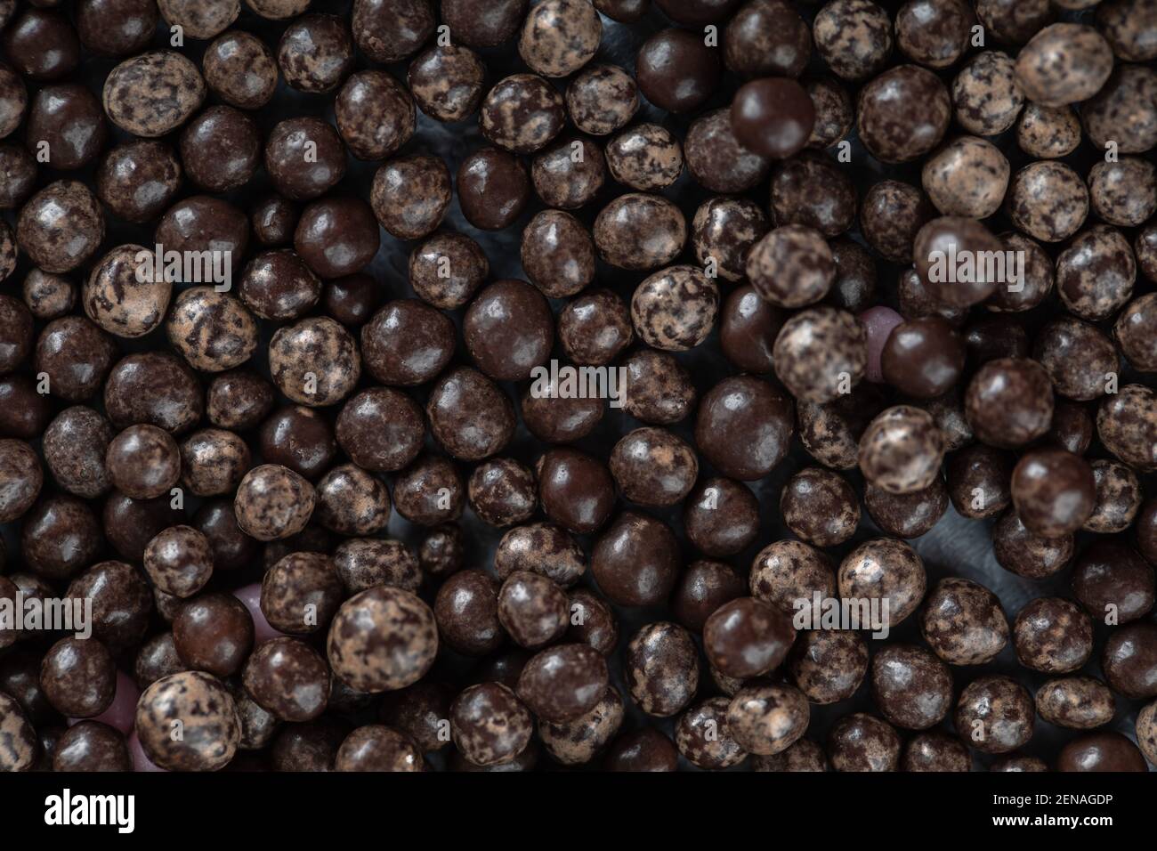 Bunch of chocolate drop candies background Stock Photo Alamy