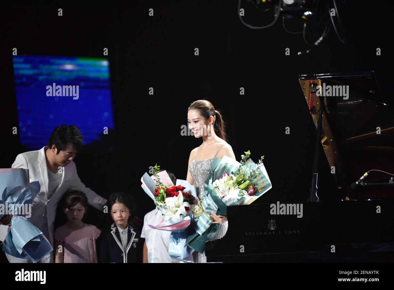 Chinese pianist Lang Lang and his wife Gina Alice Redlinger perform