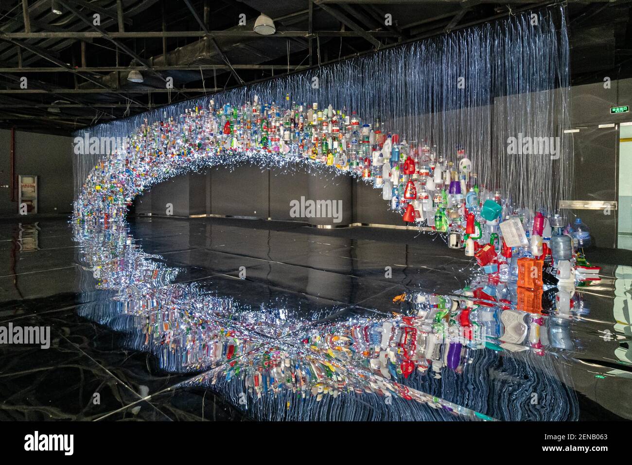 An art installation made of hundreds of plastic bottles is displayed