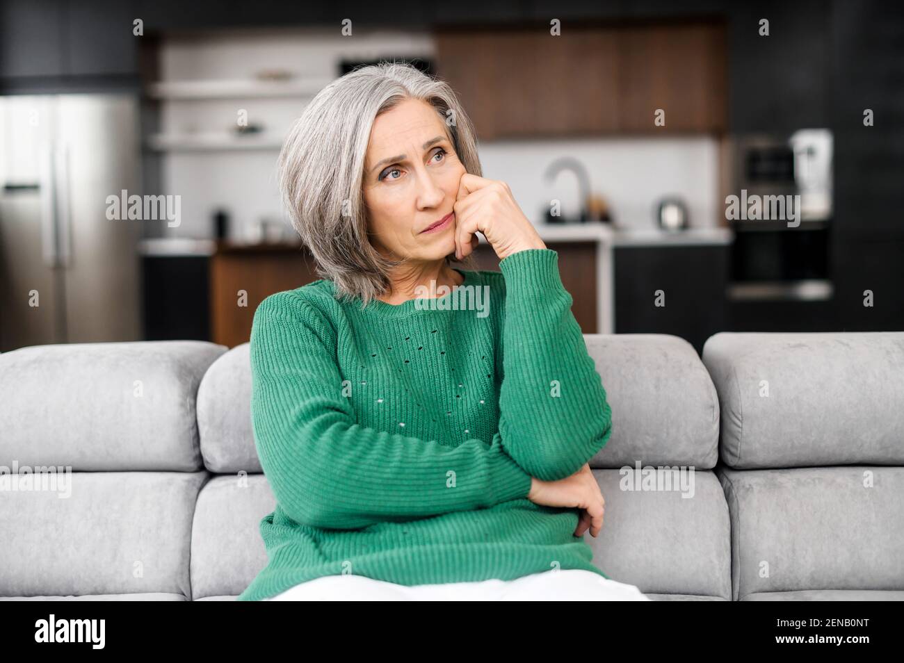 Elderly woman grey hair sad hi-res stock photography and images - Alamy