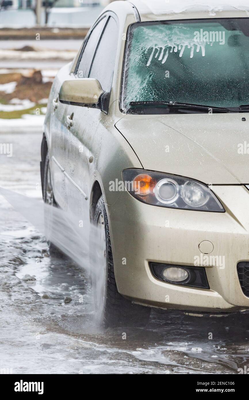 car wash with water and foam cleaning. auto, service vehicle industry