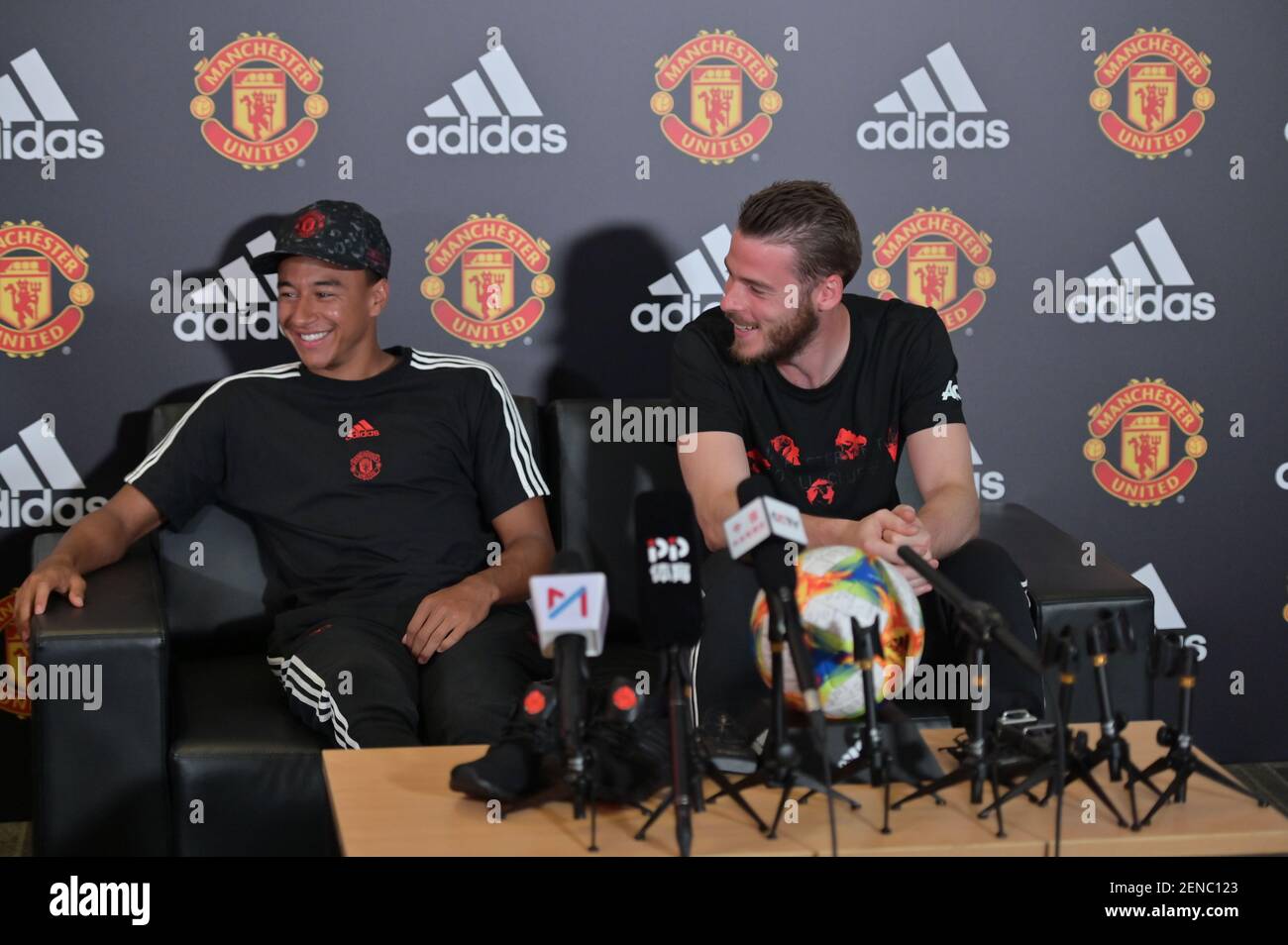 Jesse Lingard, left, Spanish football player David de Gea of Manchester  United F.C. of Premier League attend a promotional event for adidas during  2019 pre-season tour in Shanghai, China, 23 July 2019. (