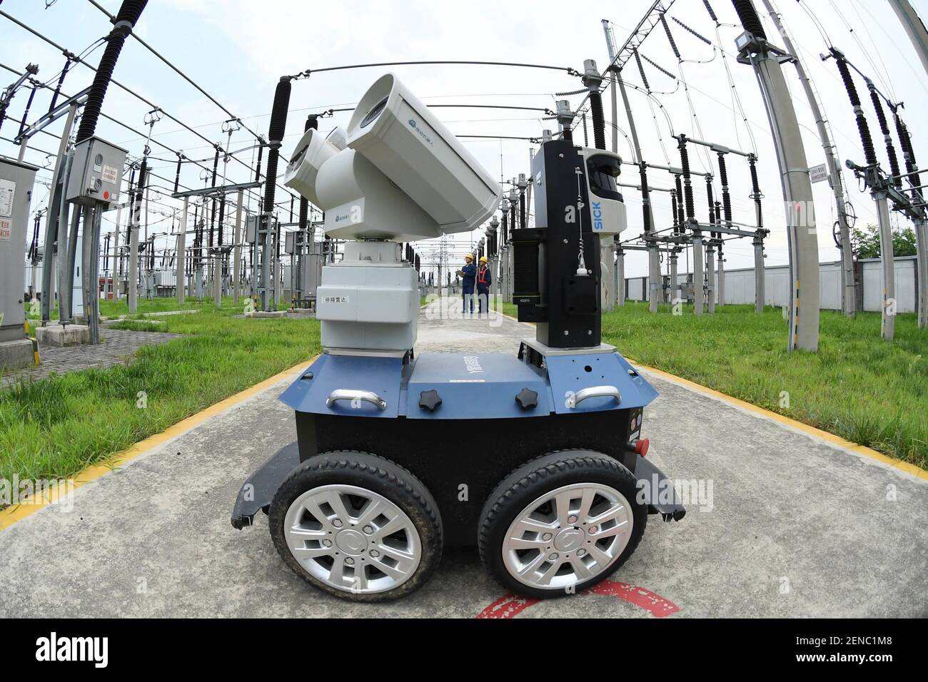 An intelligent inspection robot inspects the substation at 220 kv baoqiao  substation, Lai 'an county, Chuzhou city, Anhui province, July 23, 2019.The  robot integrates several devices, such as visible light camera and