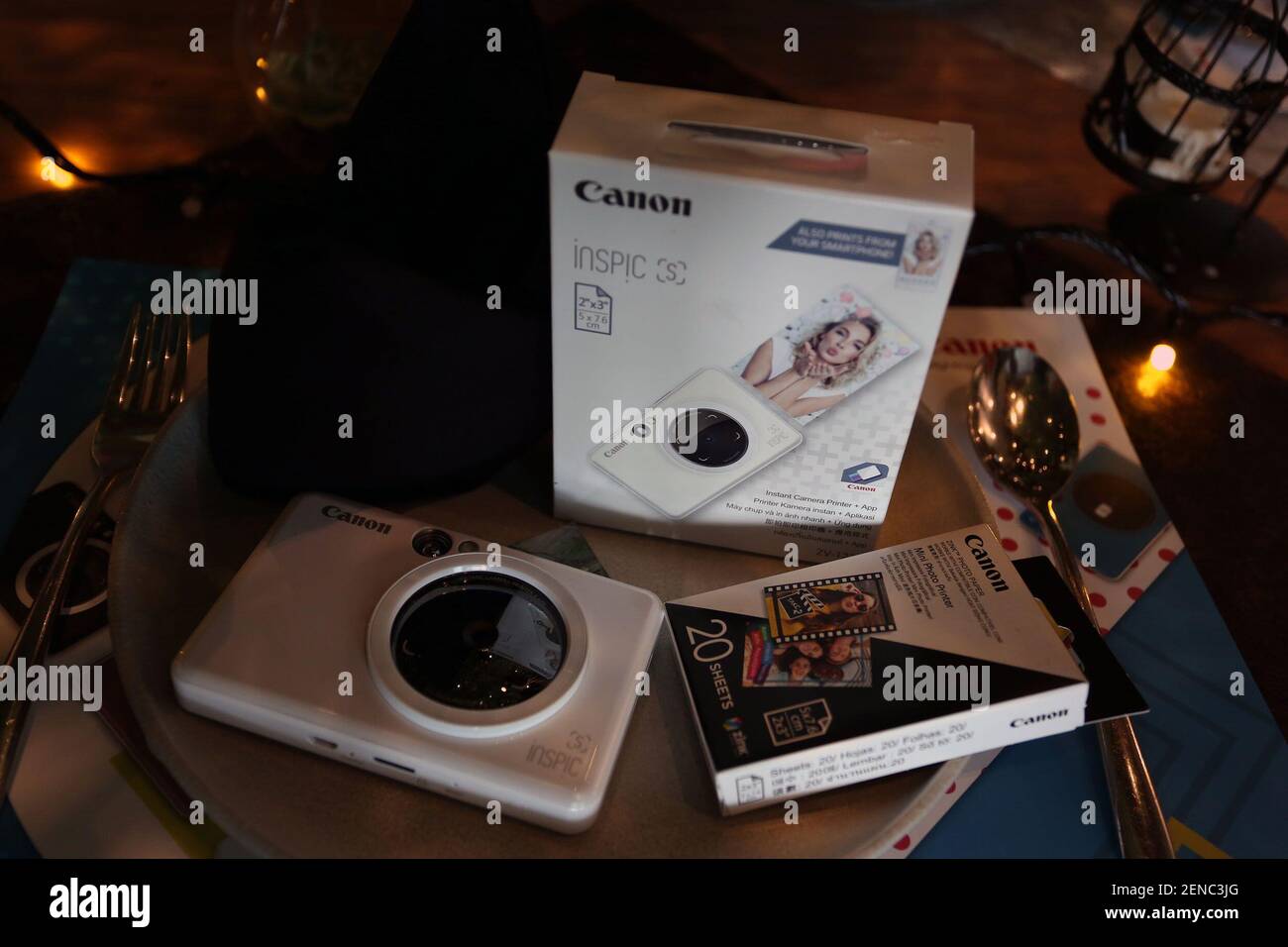 A Canon camera on the table during the launch of the Canon iNSPiC instant  printer camera in Jakarta, on July 24, 2019. Canon through Datascrip  launched the iNSPiC instant printer camera with