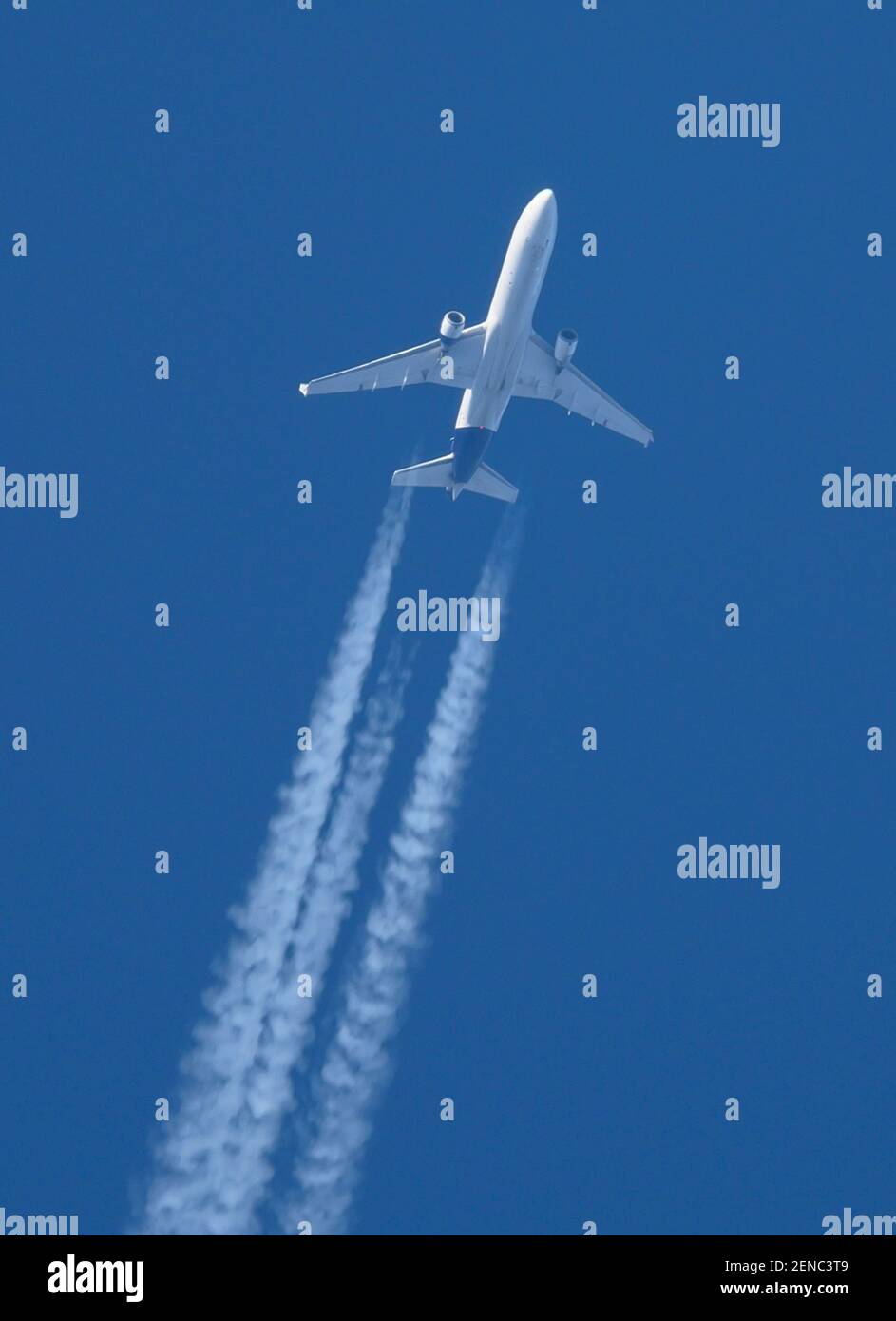 Wimbledon, London, UK. 26 February 2021. Lufthansa Cargo McDonnell Douglas MD-11F flies over London at 35,000ft from Chicago en route to Frankfurt. Credit: Malcolm Park/Alamy Live News. Stock Photo