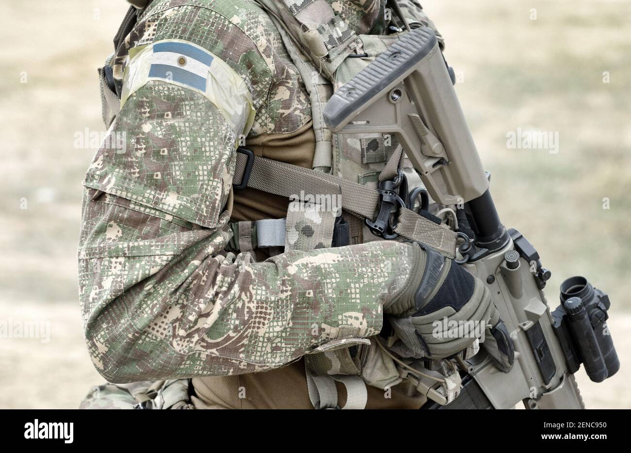 Soldier with assault rifle and flag of on uniform. Collage Stock Photo Alamy