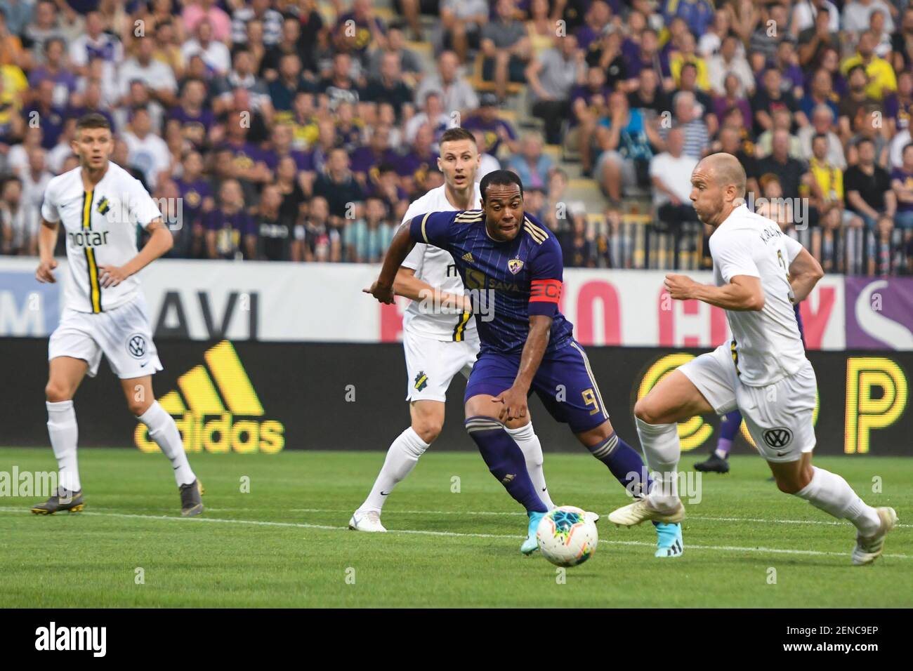 Marcos Tavares of Maribor and Per Karlsson of AIK in action during the  Second qualifying round of the UEFA Champions League between NK Maribor and  AIK Football at the Ljudski vrt stadium