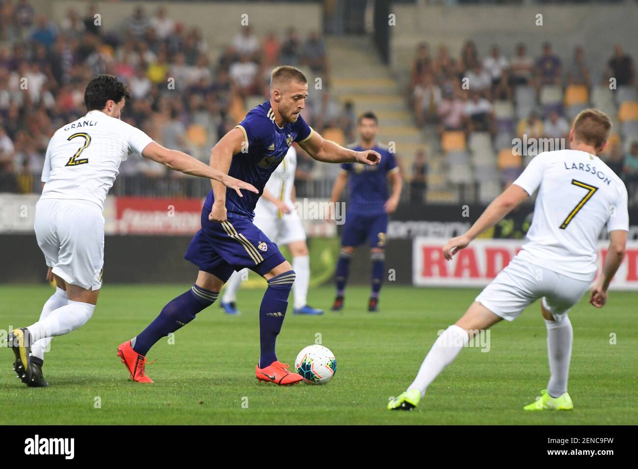 Daniel Granli, Sebastian Larsson of AIK and Andrej Kotnik of Maribor in  action during the Second qualifying round of the UEFA Champions League  between NK Maribor and AIK Football at the Ljudski