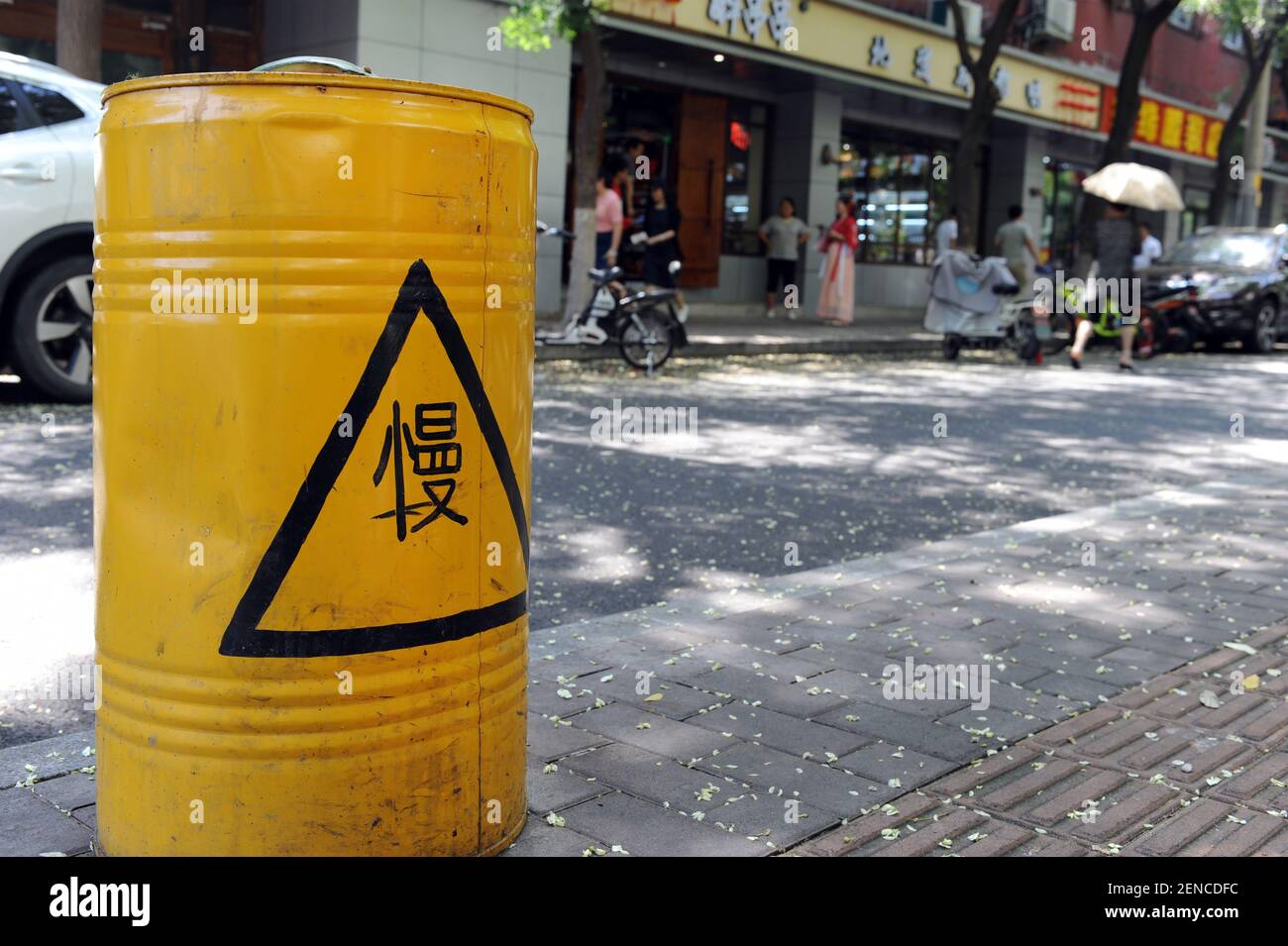 Hundreds of trash bins covered with cartoon characters and tips for ...