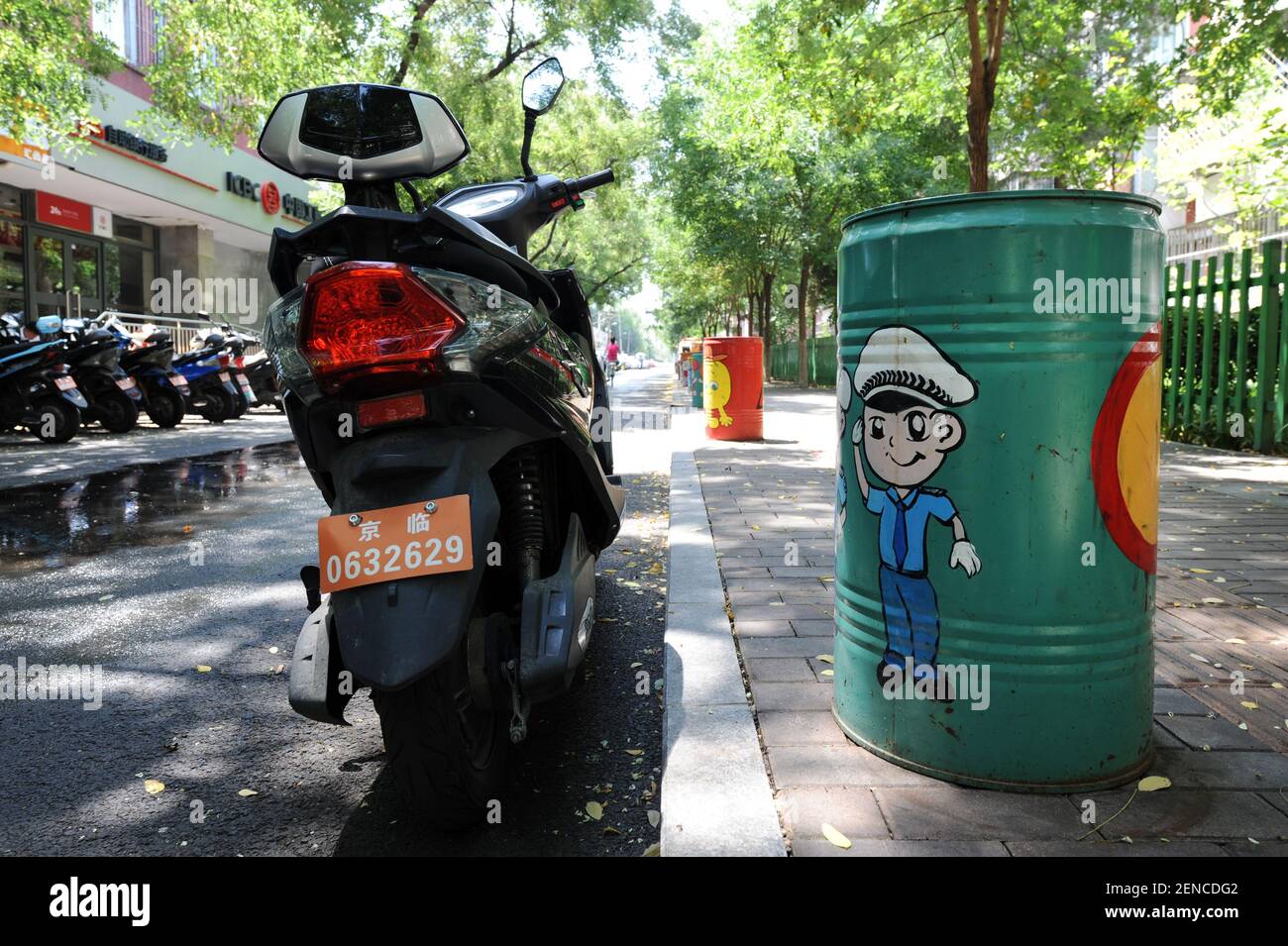 Hundreds of trash bins covered with cartoon characters and tips for ...