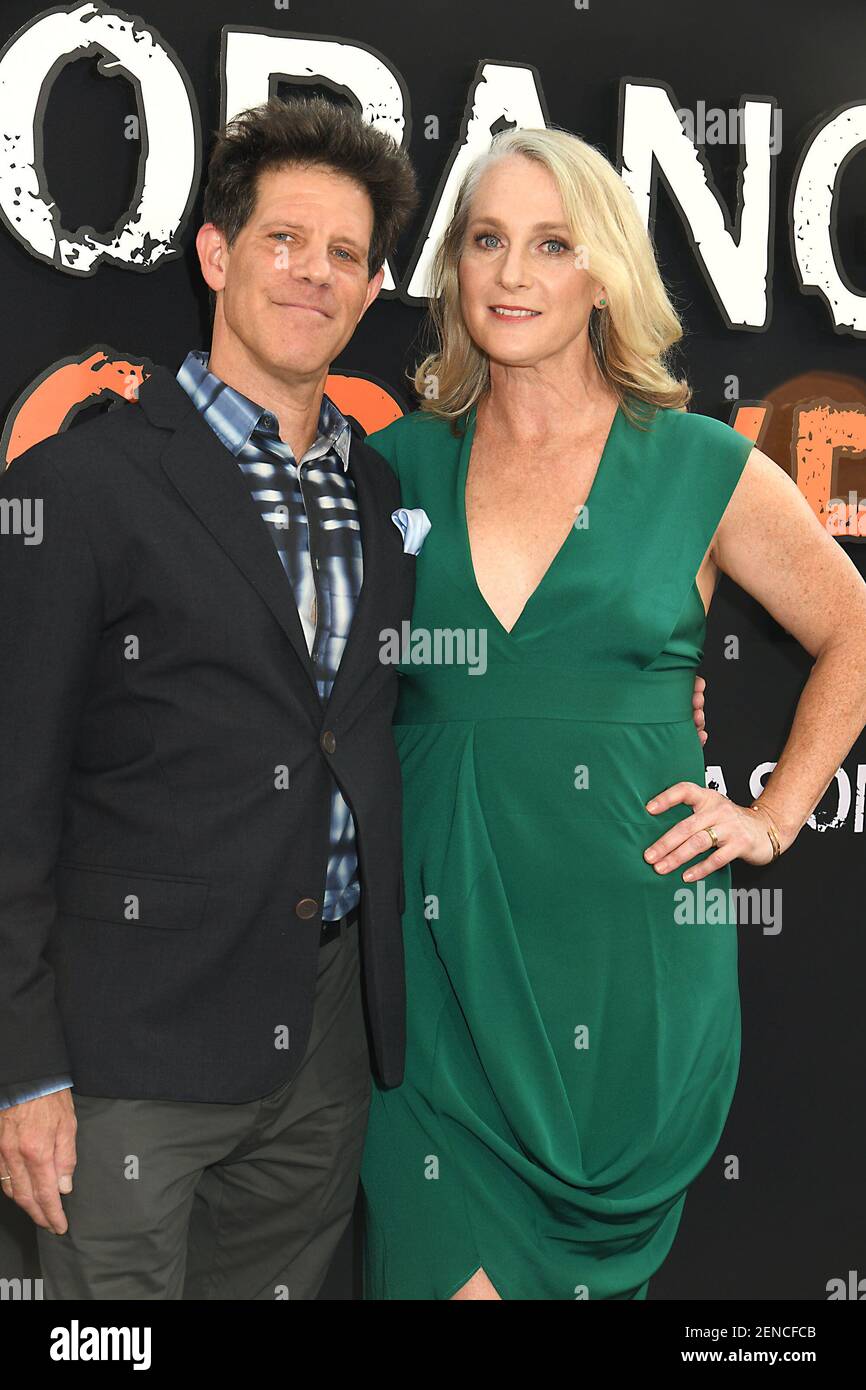 Larry Smith and writer Piper Kerman attends the Netflix show