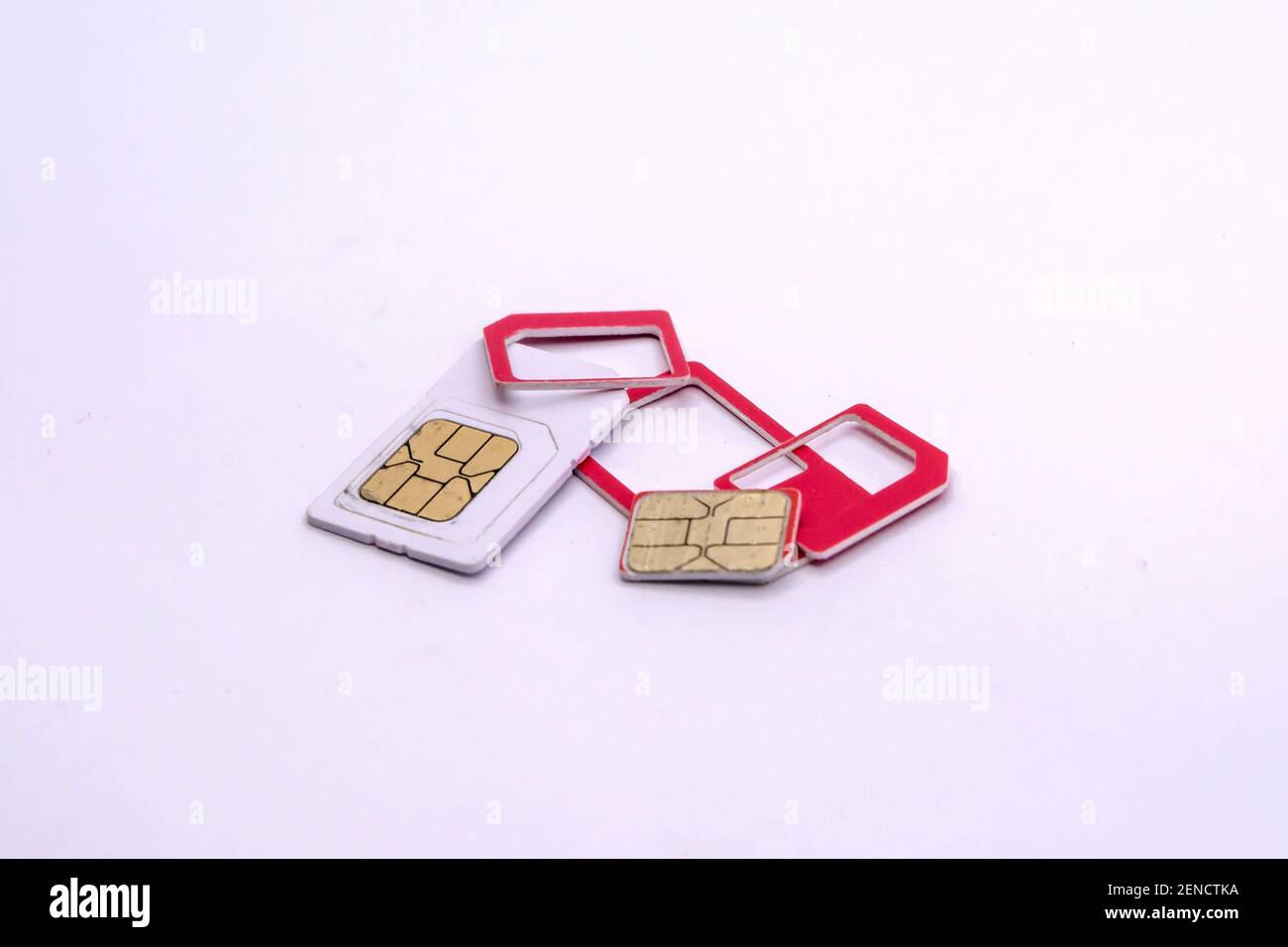 subscriber identification module or SIM card. SIM card in different sizes isolated on white background. mini, micro, nano sim. gsm chip. Stock Photo