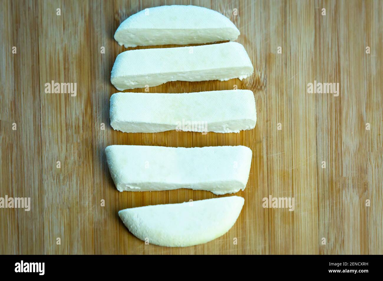 Homemade paneer cheese made from fresh milk and lemon juice, diced on a