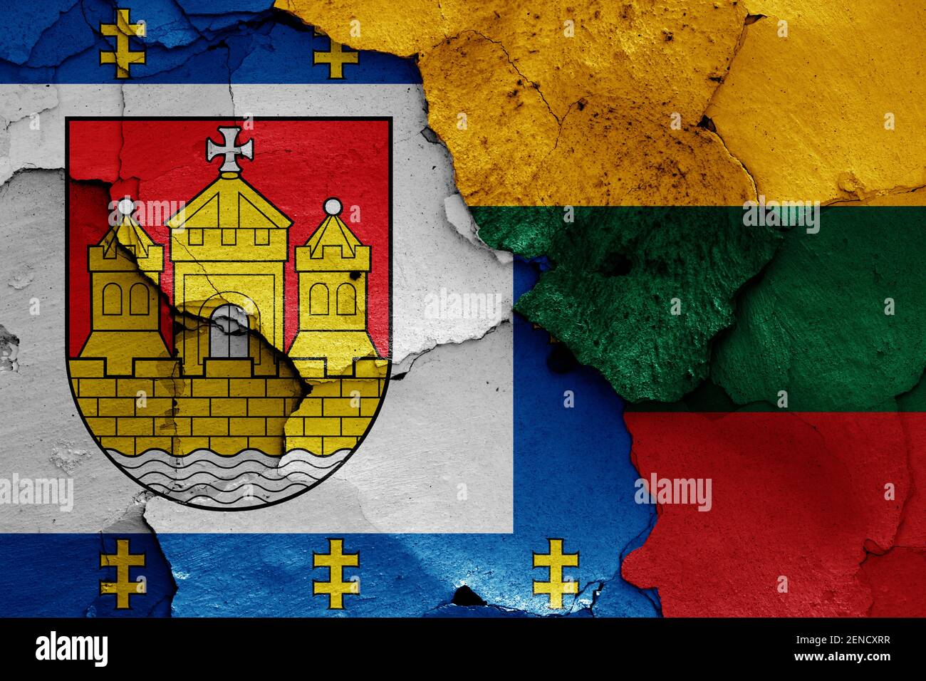flags of Klaipeda County and Lithuania painted on cracked wall Stock Photo