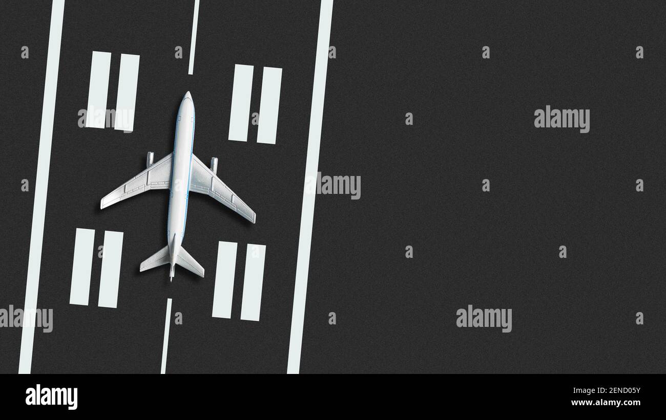 Airplane concept on the runway with copy space Stock Photo - Alamy