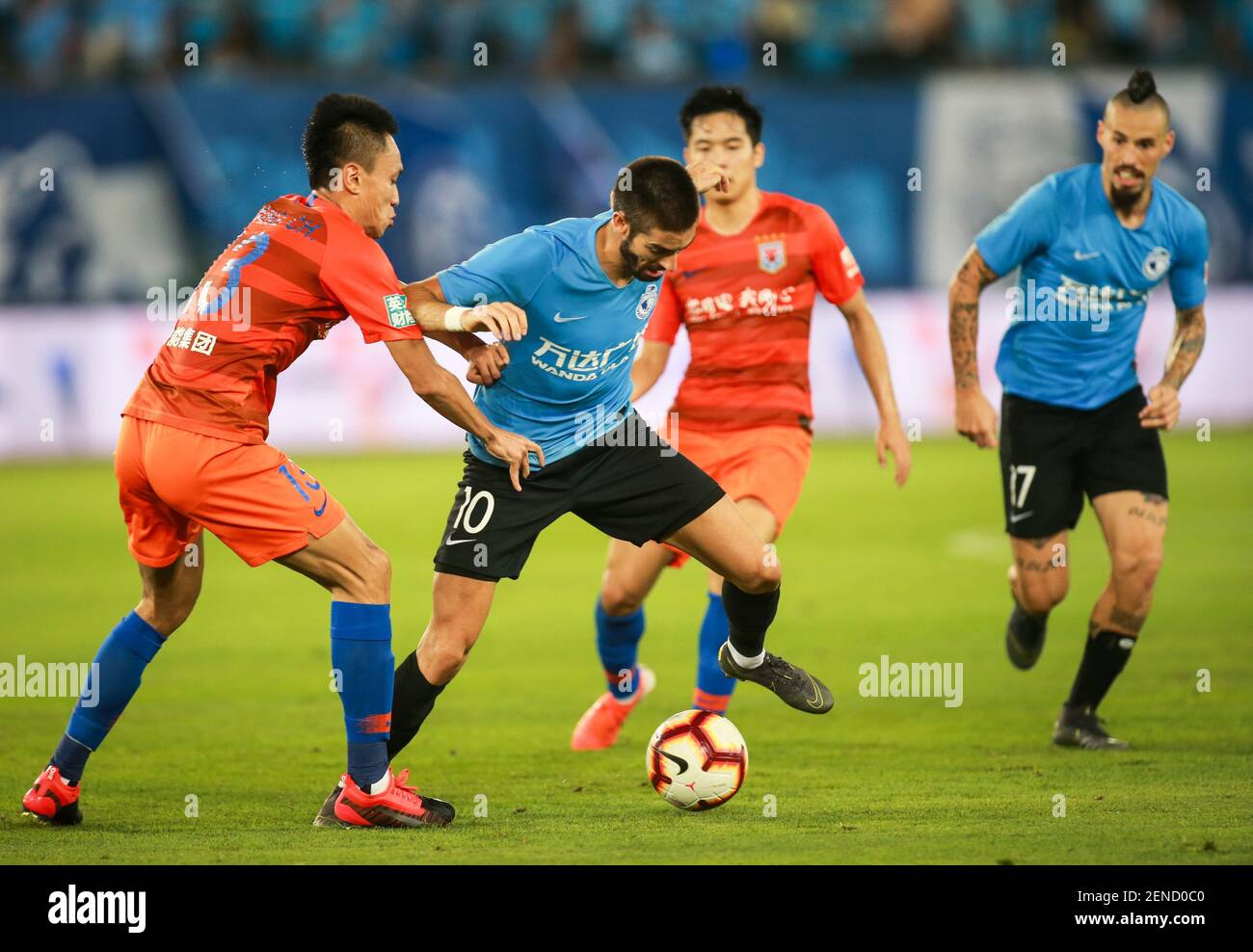 Belgian football player Yannick Ferreira Carrasco, center, of Dalian