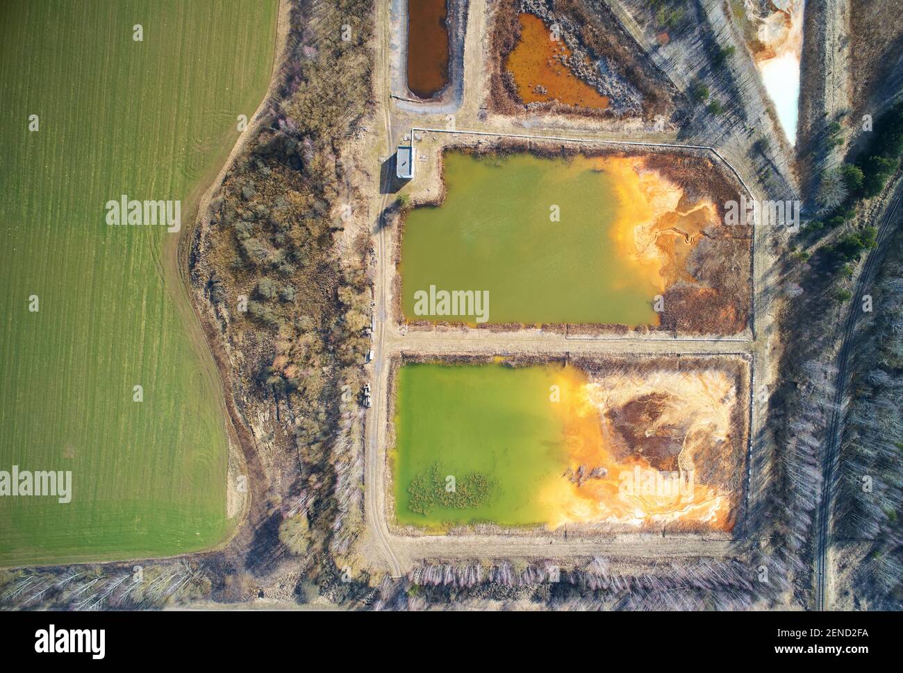 Green toxic hazardous lake above drone top view Stock Photo
