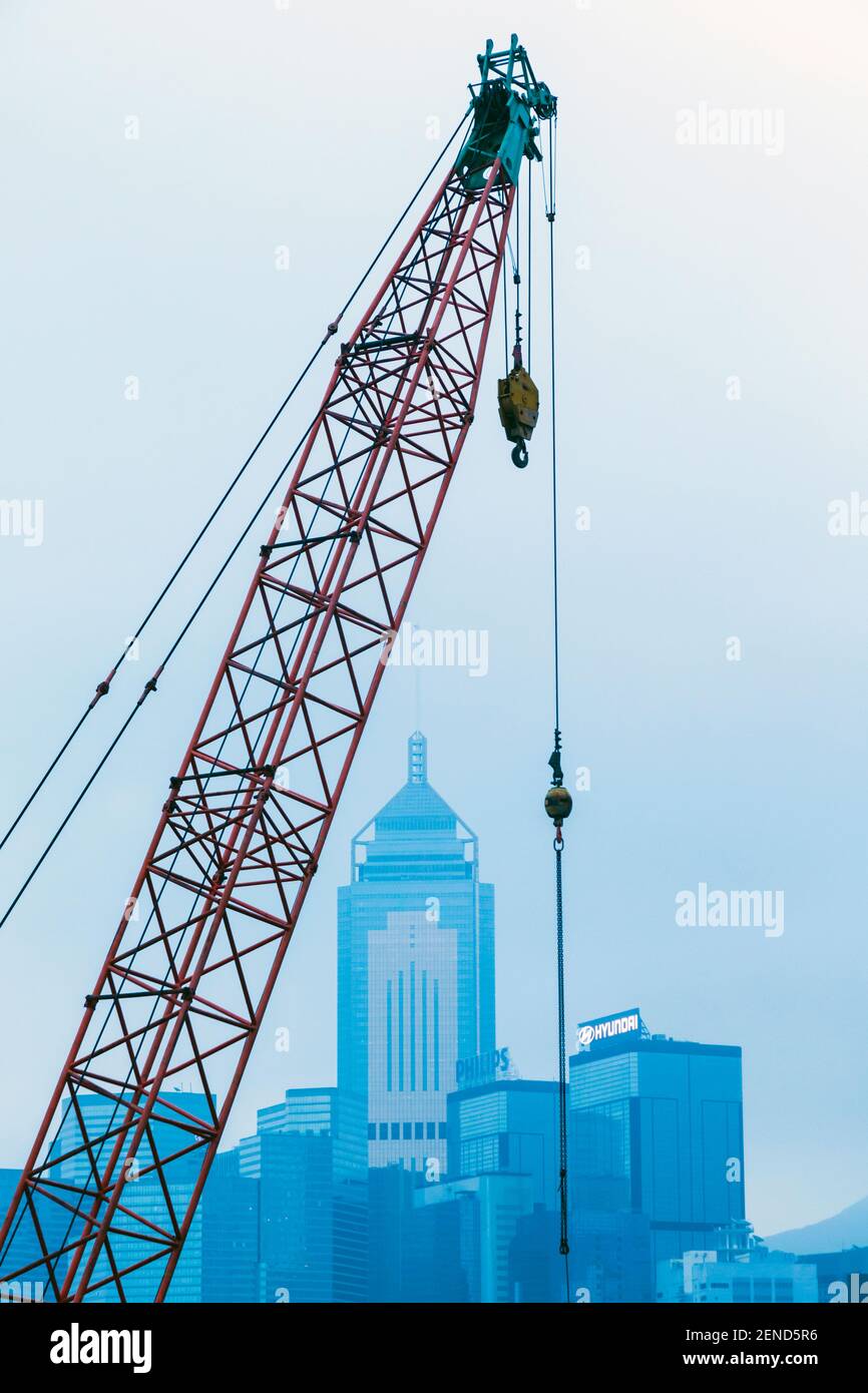 Hong Kong, China.  City buildings and crane. Stock Photo