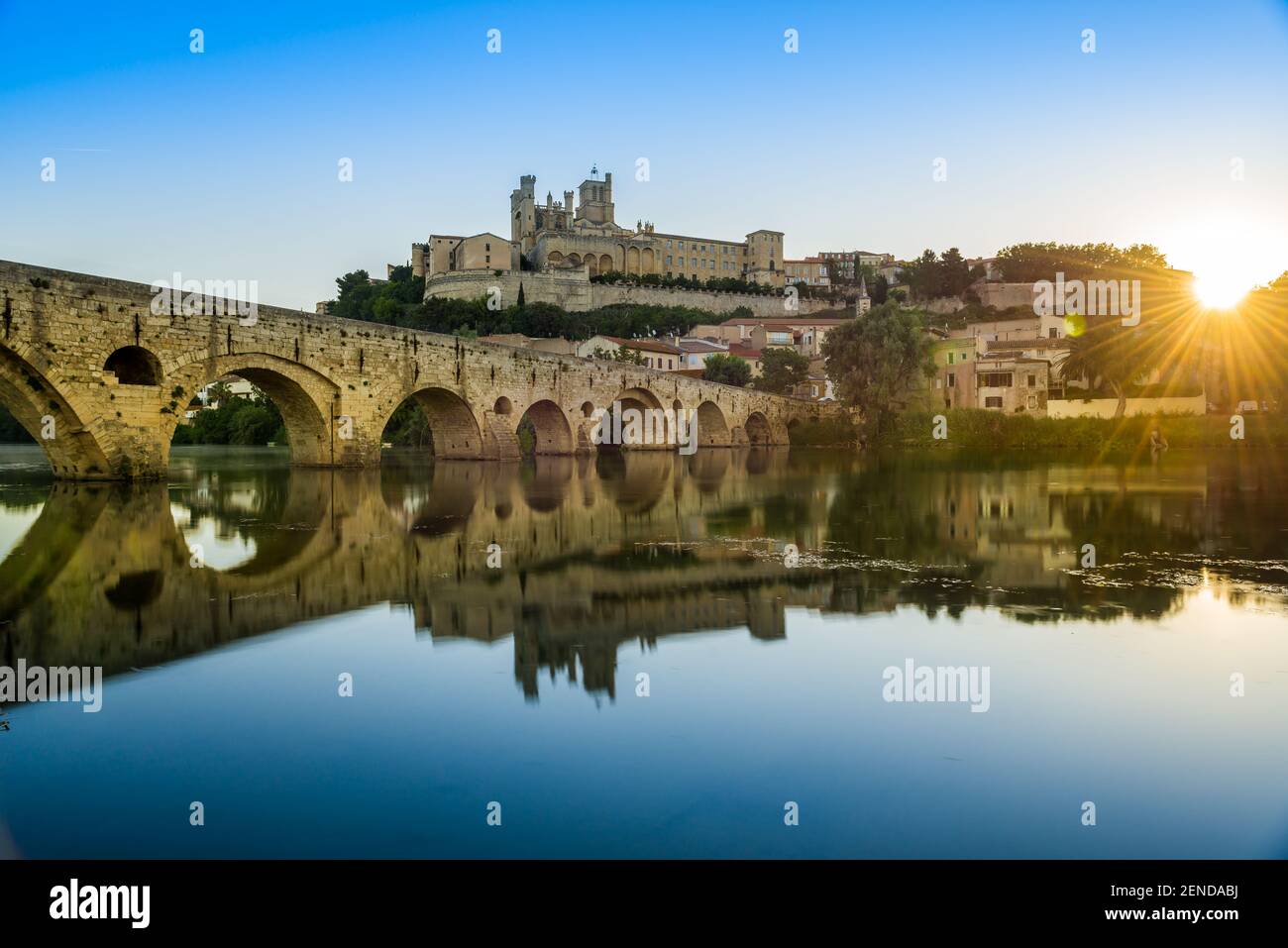 Old bridge over the river Orb, and the Saint-Nazaire cathedral, in Beziers, France Stock Photo