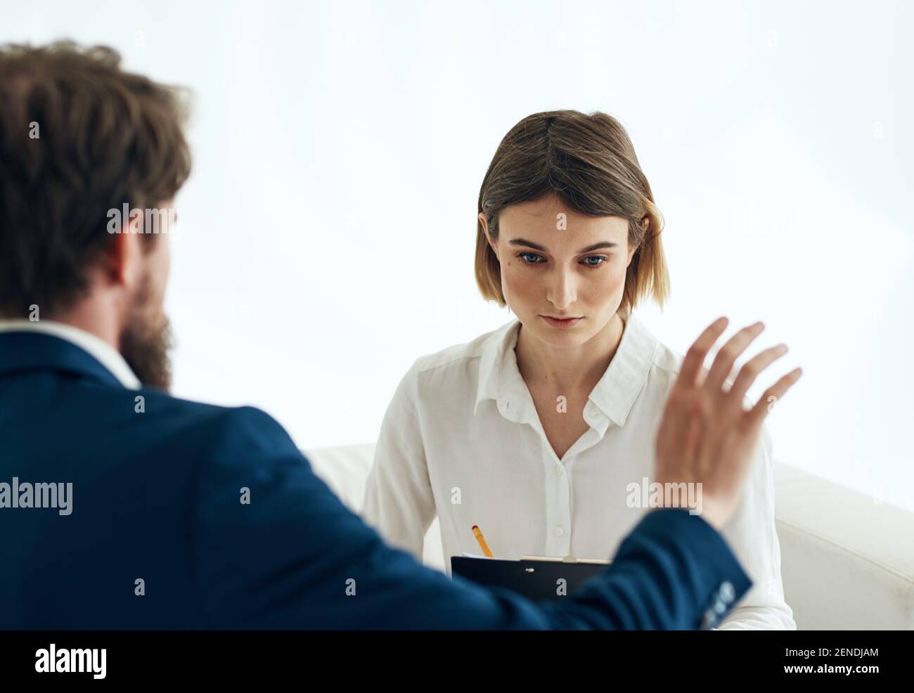 woman and man suit documents communication resume Stock Photo