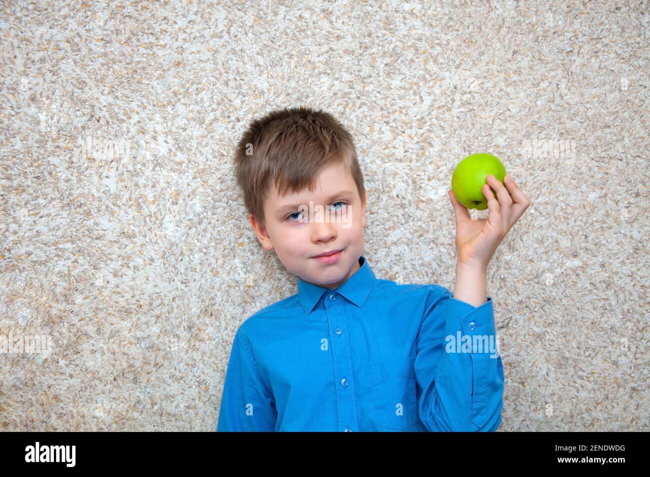 Child boy with apple, healthy food Stock Photo