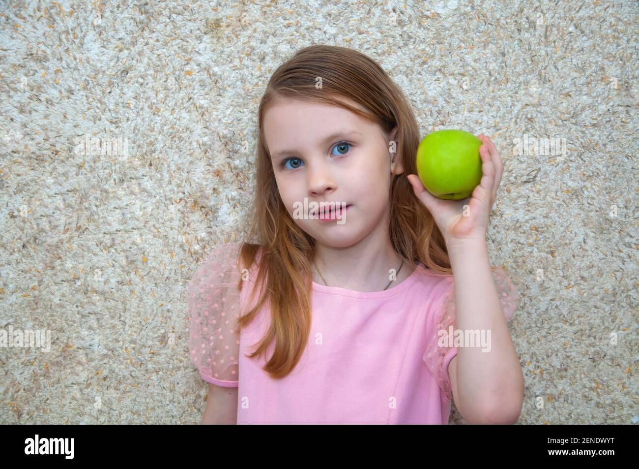 Child girl with apple, healthy food Stock Photo