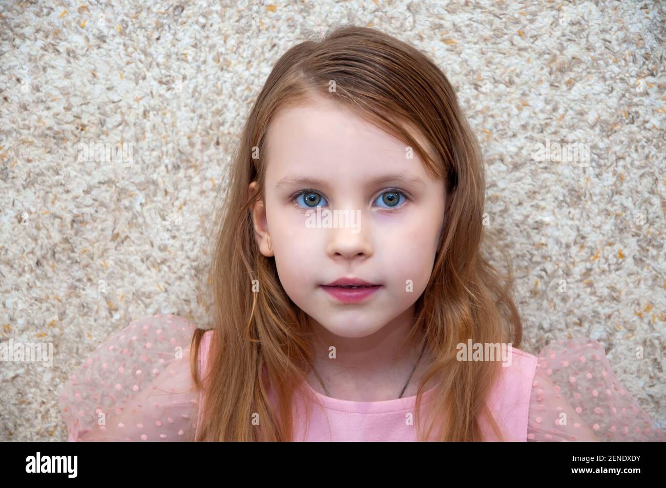 Happy smiling girl portrait in pink dress Stock Photo - Alamy