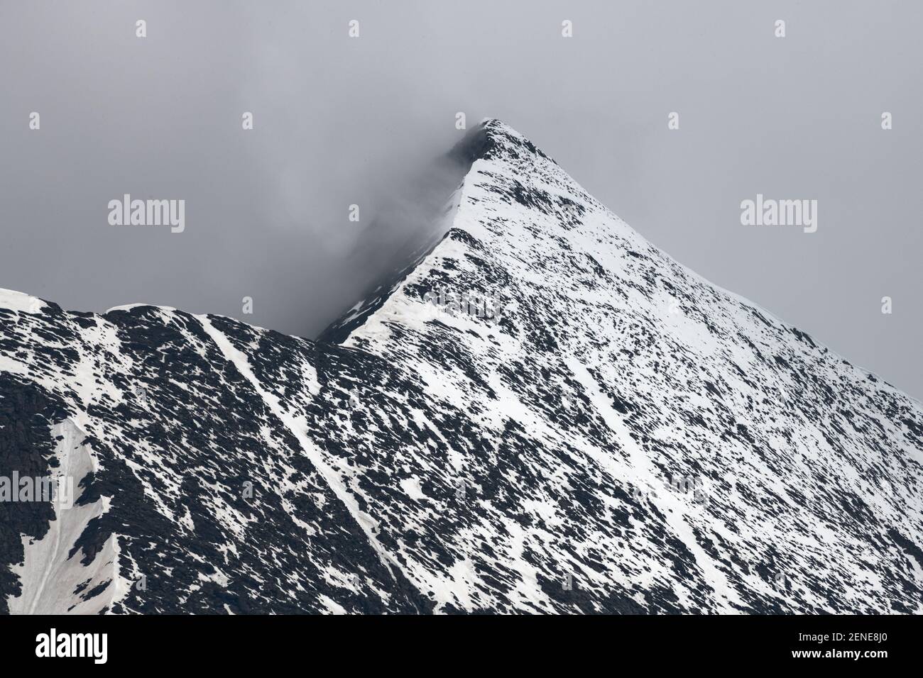 Hohe Dock mountain from below and north east on a snowy day, Glocknergruppe, Salzburg, Austria Stock Photo
