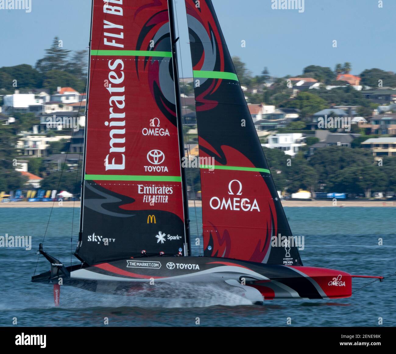 Auckland, New Zealand, 26 February, 2021 -  Emirates Team New Zealand's Te Rehutai, skippered by Peter Burling,  speeds through the Waitemata Harbour during a training session ahead of their America's Cup clash with the Italian team Luna Rossa Prada Pirelli in the America's Cup starting on March 6. There are expectations that the foiling AC75 class yachts will break the 100kmh speed barrier during the competition. Credit: Rob Taggart/Alamy Live News Stock Photo