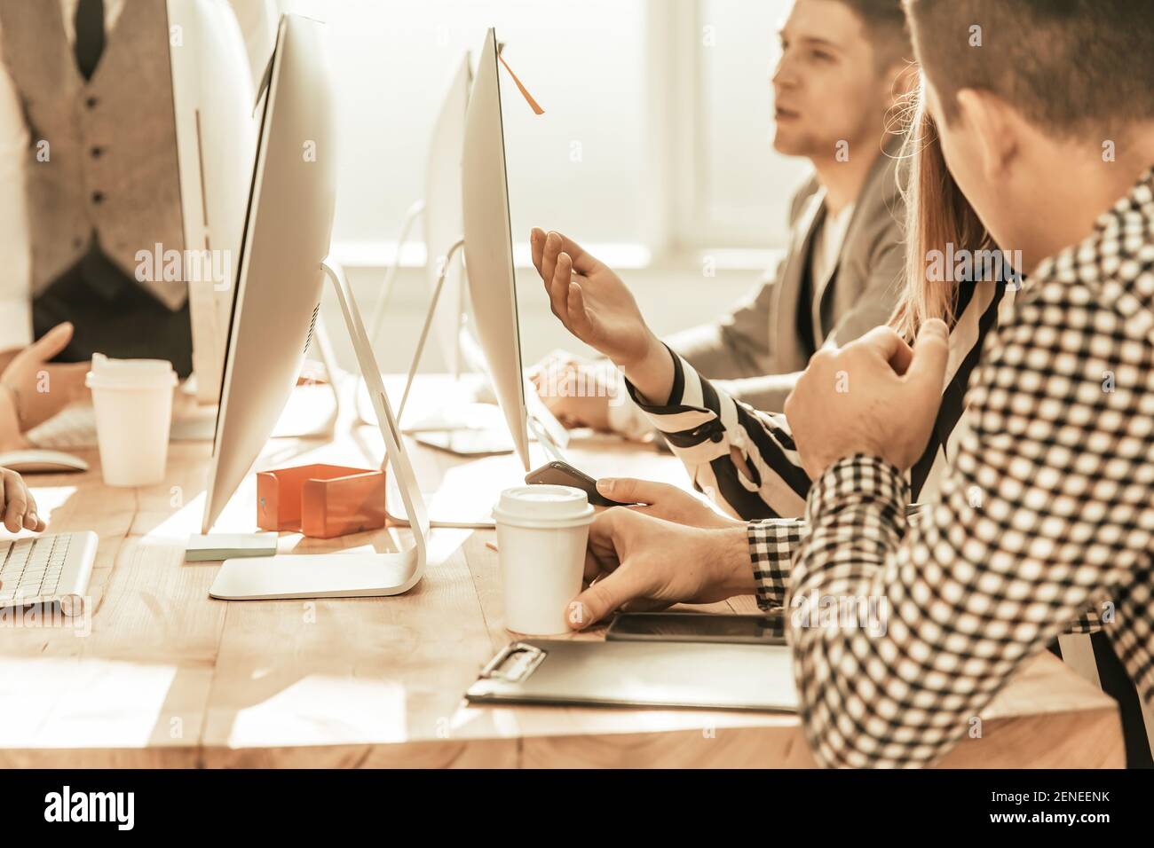 working group is working on a new project in the office Stock Photo