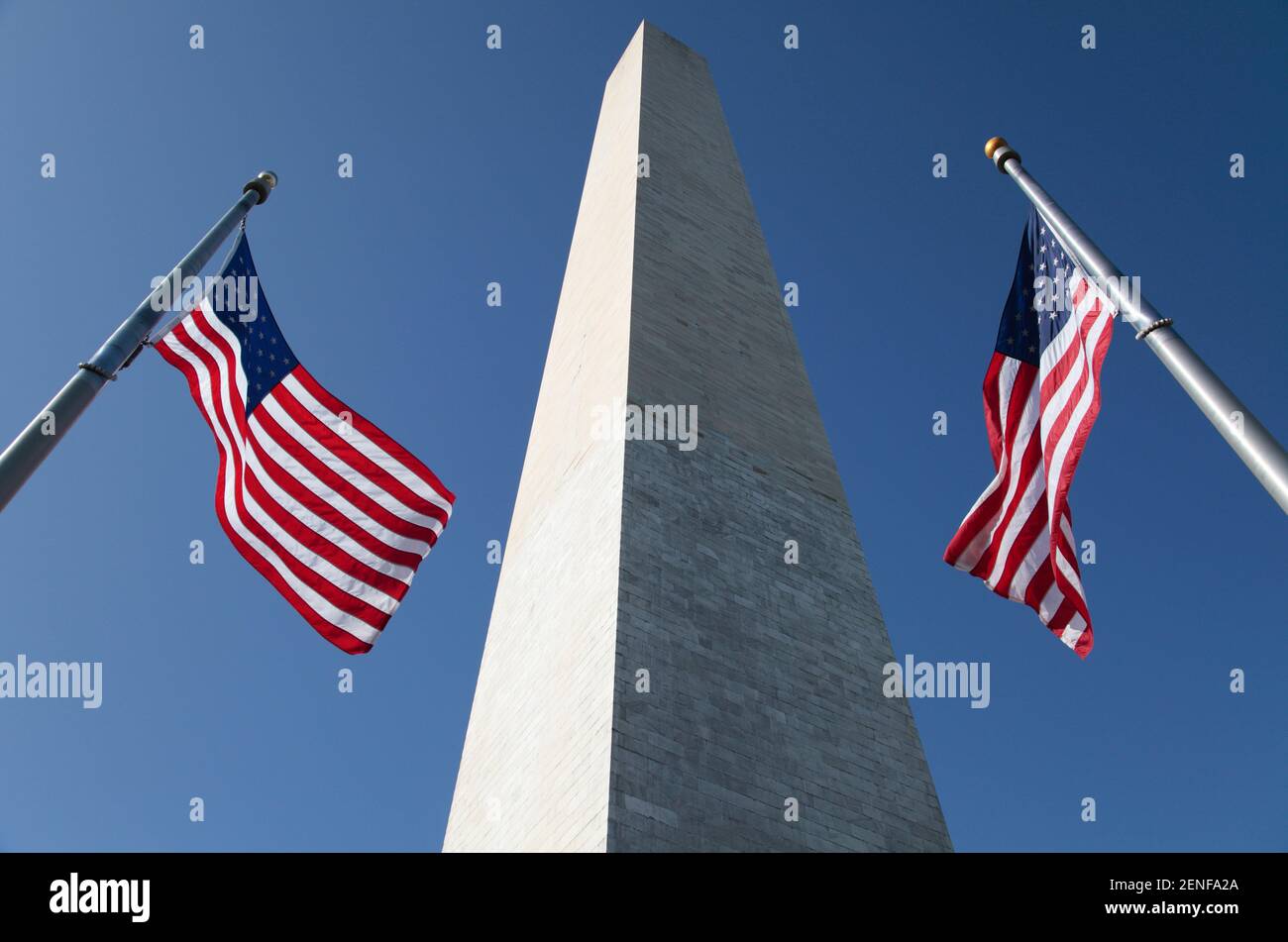 USA Flag and George Washington Monument from National World War Two Memorial, The Mall, Washington D.C., United States of America. T Stock Photo