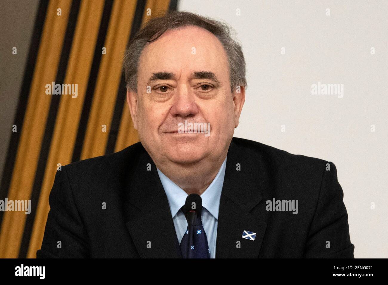 Former Scottish National Party leader and former First Minister of Scotland, Alex Salmond is sworn in before giving evidence to The Committee on the Scottish Government Handling of Harassment Complaints at Holyrood, examining the government's handling of harassment allegations against him, in Edinburgh, Scotland, Britain February 26, 2021.  Andy Buchanan/Pool via REUTERS Stock Photo