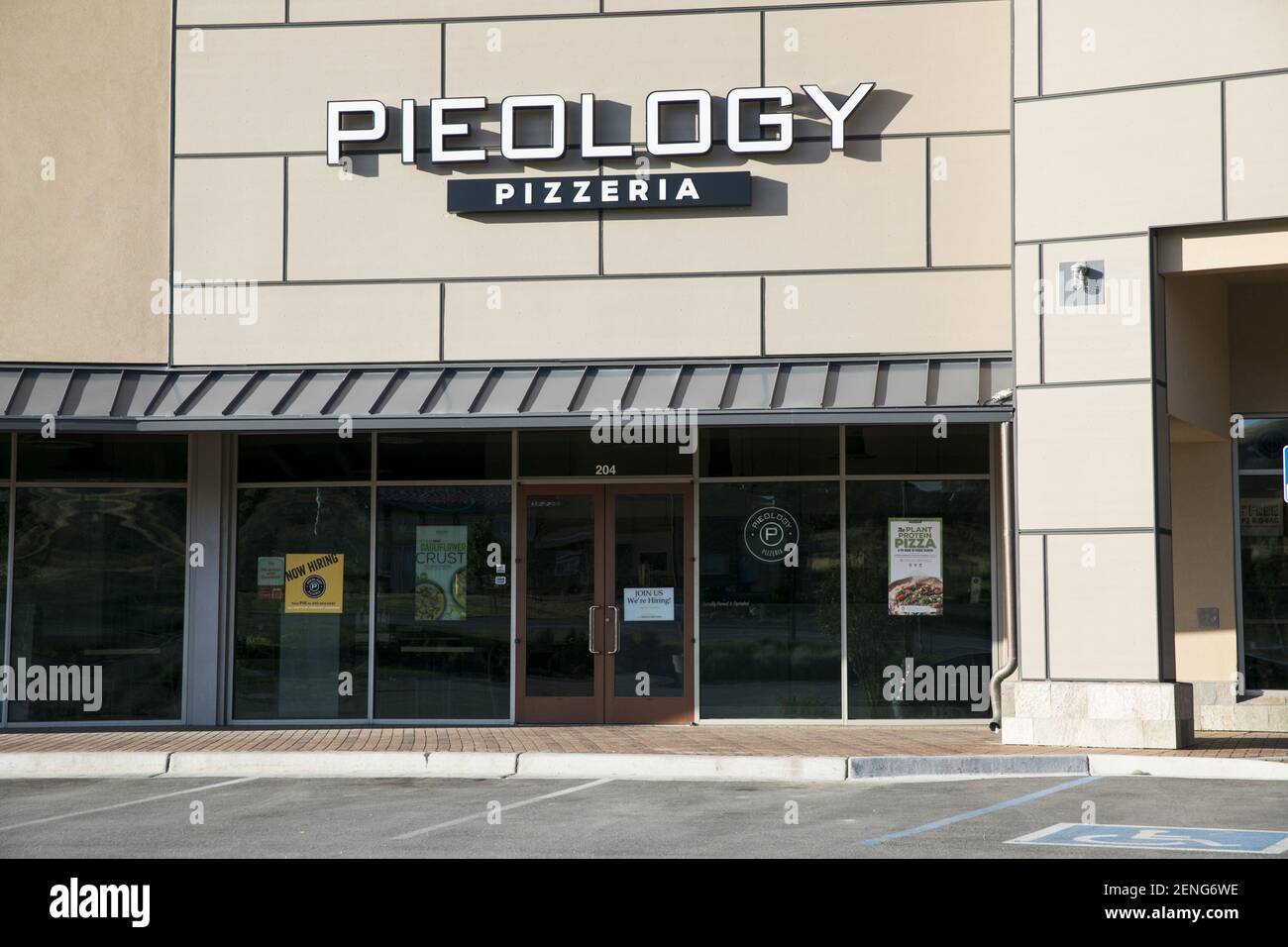 A logo sign outside of a Pieology Pizzeria restaurant location in Lehi, Utah on July 28, 2019