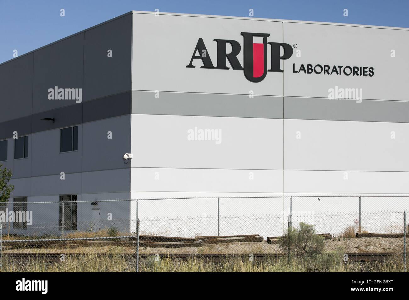 A logo sign outside of a facility occupied by ARUP Laboratories in Salt