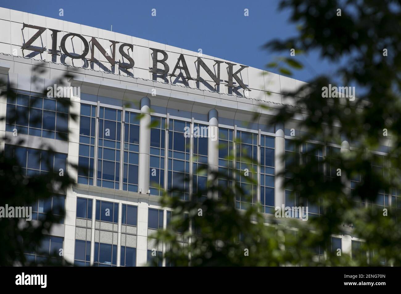 A logo sign outside of the headquarters of Zions Bank in Salt Lake City ...