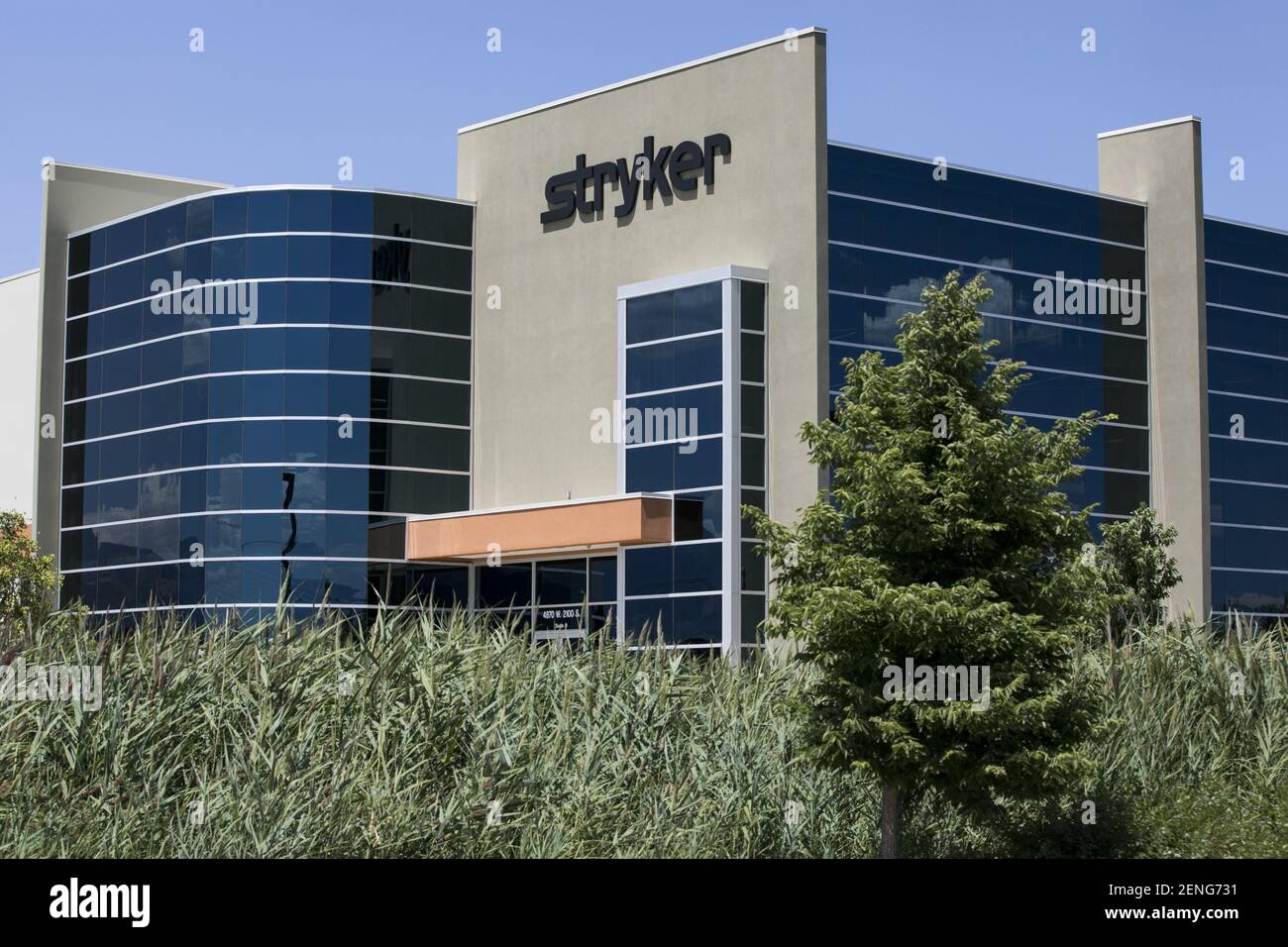 A logo sign outside of a facility occupied by the Stryker Corporation in Salt Lake City, Utah on